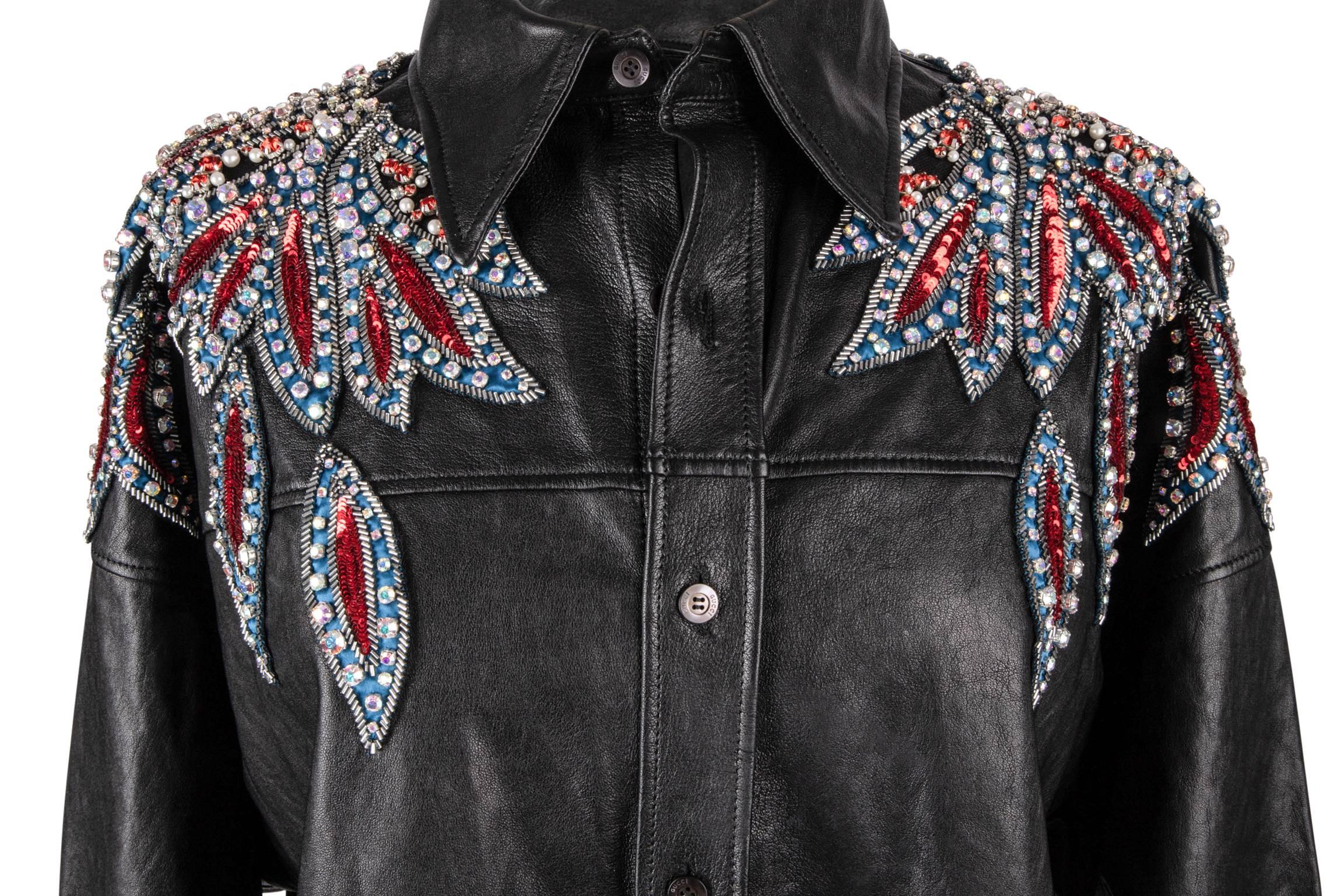 Guaranteed authentic Gucci S/S 2018 leather shirt with sensational sequin and crystal work in western influence around the shoulders. 
Red, blue and white set on distressed leather button front.
Button cuffs.
Soft kid leather. 
NEW or NEVER