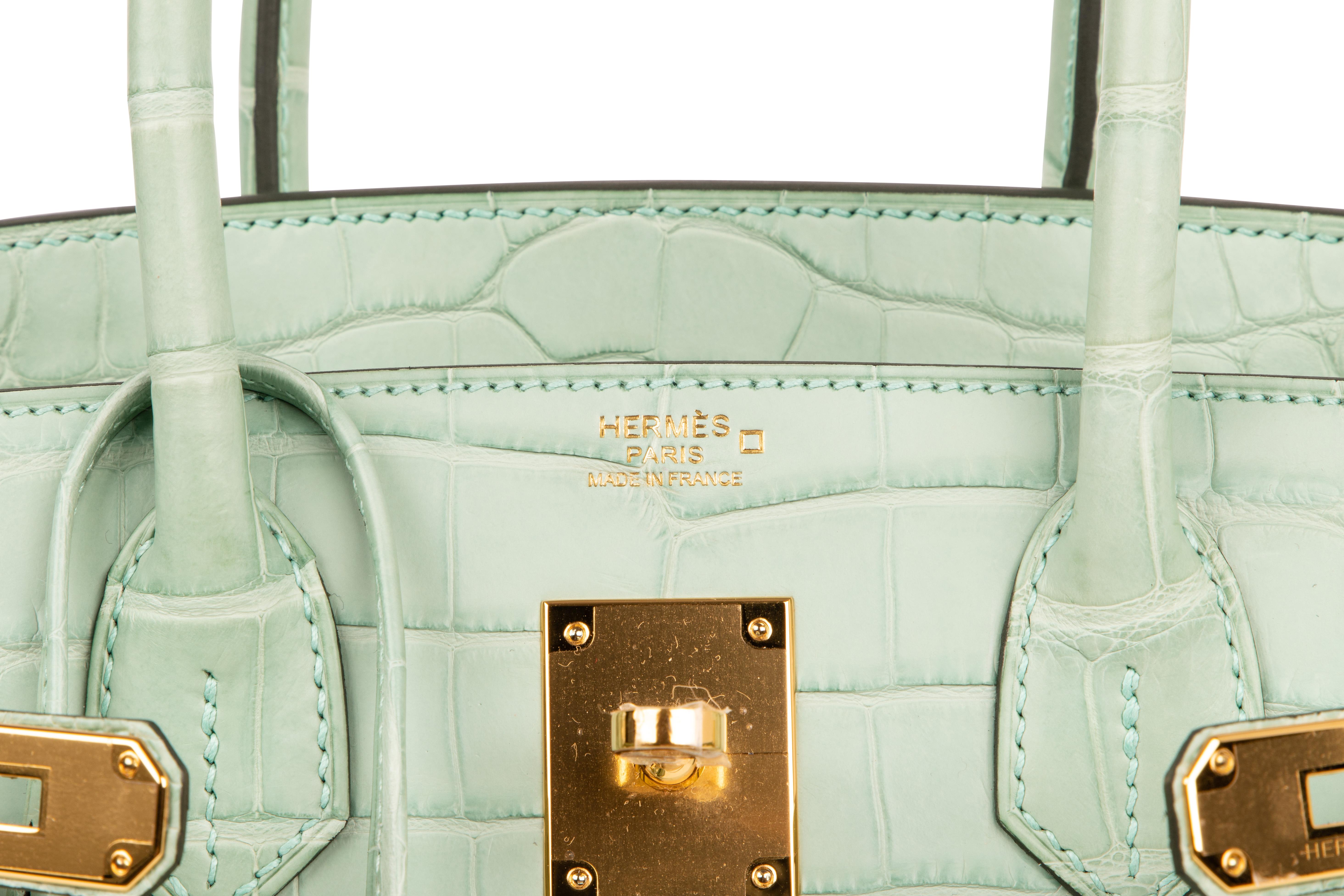 Guaranteed authentic matte alligator Hermes Birkin bag 30cm in rare breathtaking Vert D'Eau.
This exquisite colour in matte alligator with gold hardware is simply one of the most gorgeous to step out of the House of Hermes. 
Comes with the lock and
