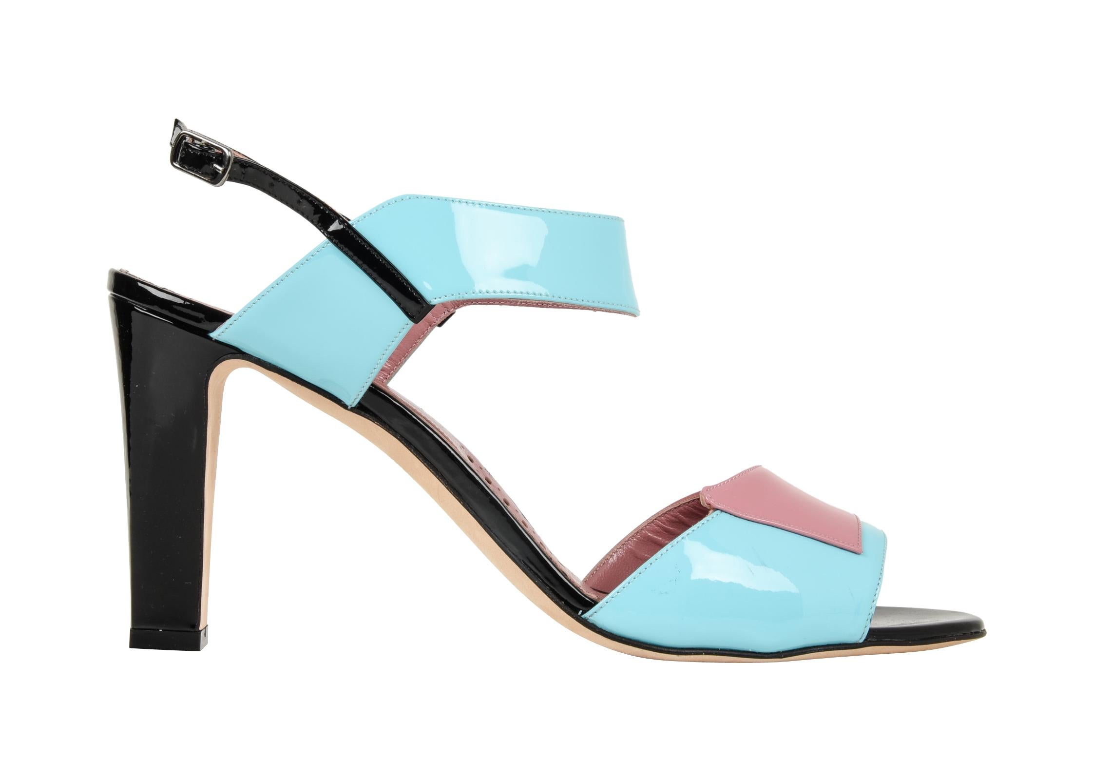 Guaranteed  authentic Manolo Blahnik lovely summer patent leather sandal Deco inspired. 
Light blue, dusty pink and black combined with the architectural details makes you think Deco!
Modified block heel for all day comfort.
NEW or NEVER WORN
Comes