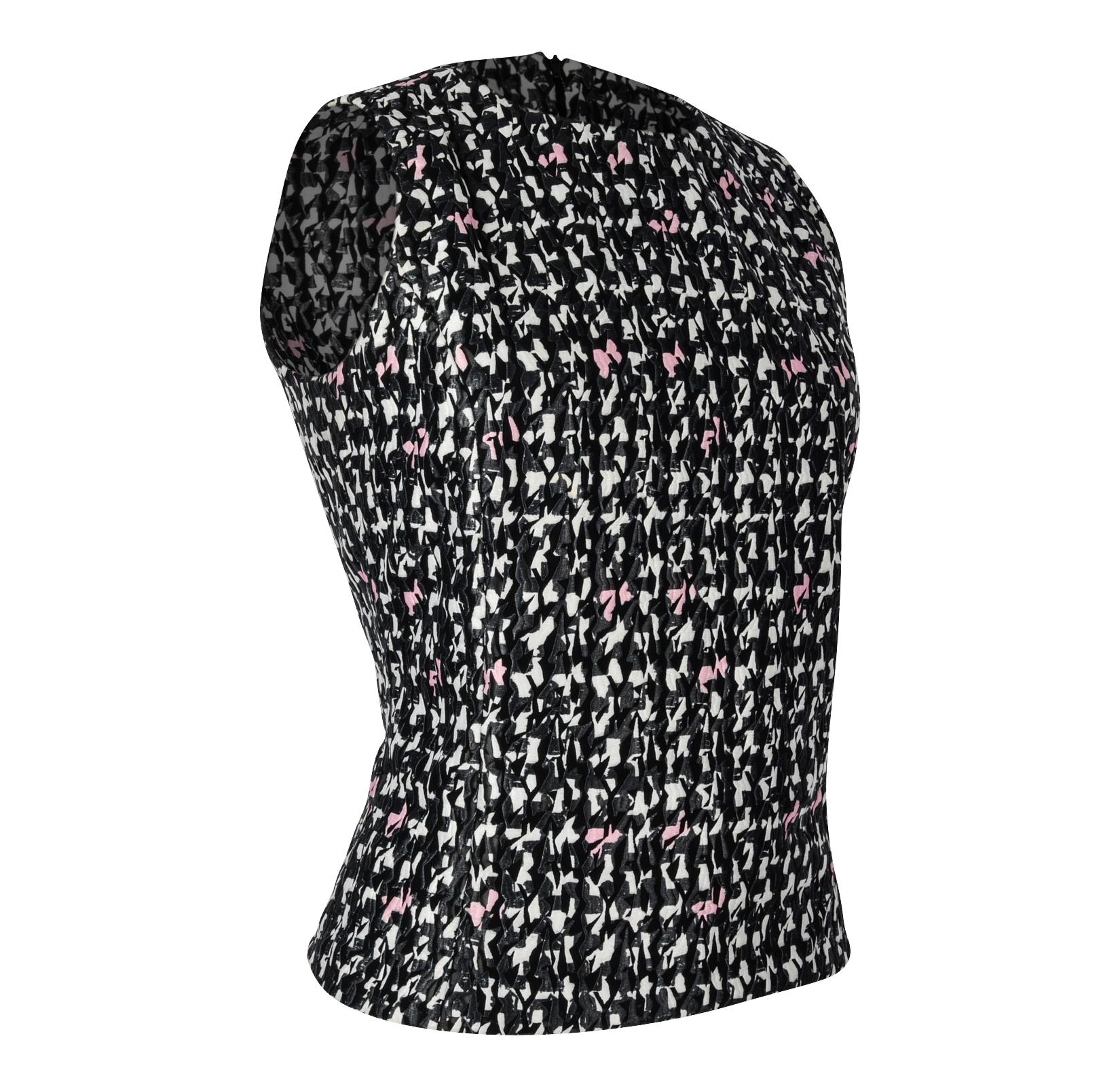 Guaranteed authentic Christian Dior fantasy tweed print fitted sleeveless top. 
Textured print in black, grey, white and pink.
Jewel neckline and hidden rear zip.
No fabric or size tag. 
final sale

SIZE fits 8

TOP MEASURES: 
LENGTH  21.5