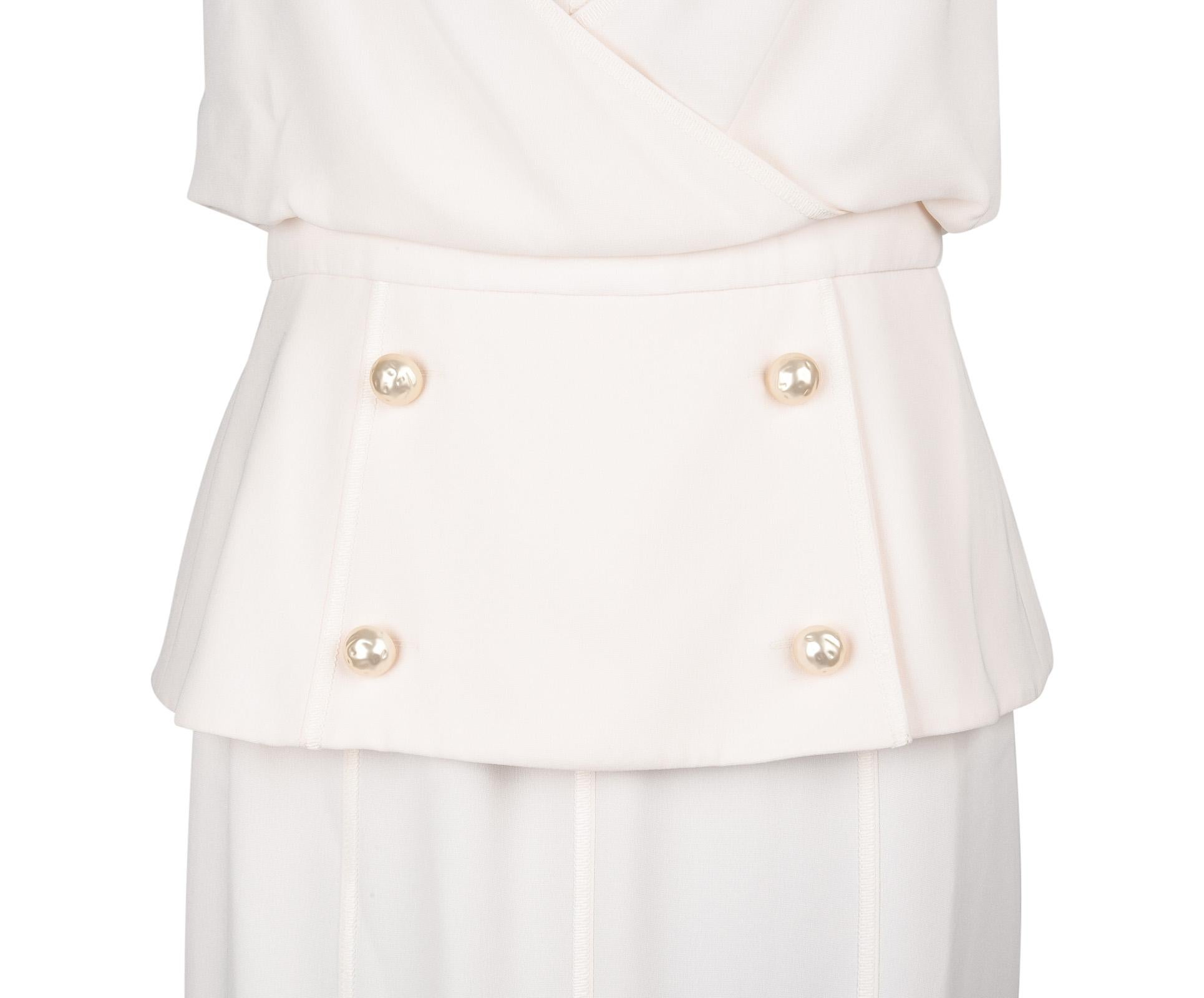 Guaranteed authentic Chanel 14C runway winter white floor length open back dress.
Squared neckline with soft draping and layering effect in front. 
Peplum waist with 4 large faux pearl buttons.
Rear is an open beautifully draped V with subtle gold