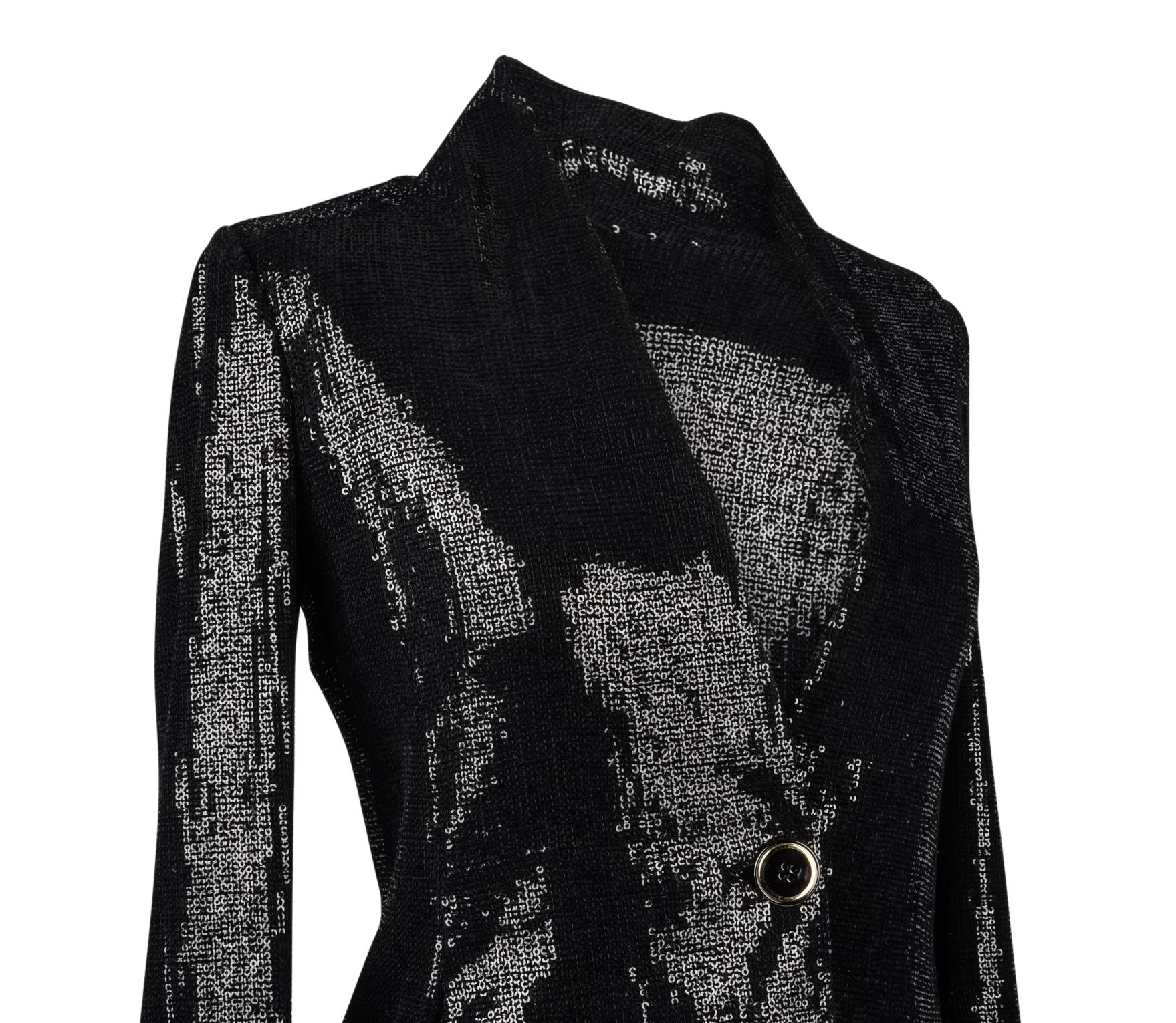 Guaranteed authentic Giorgio Armani black sequined jacket.
Beautifully shaped single breast jacket with 1 black and gold button. 
V-neck.  
Elegant simplicity. 
Jacket is lined.
NEW or NEVER WORN
final sale

SIZE 38
USA SIZE 6

TOP MEASURES:
LENGTH 