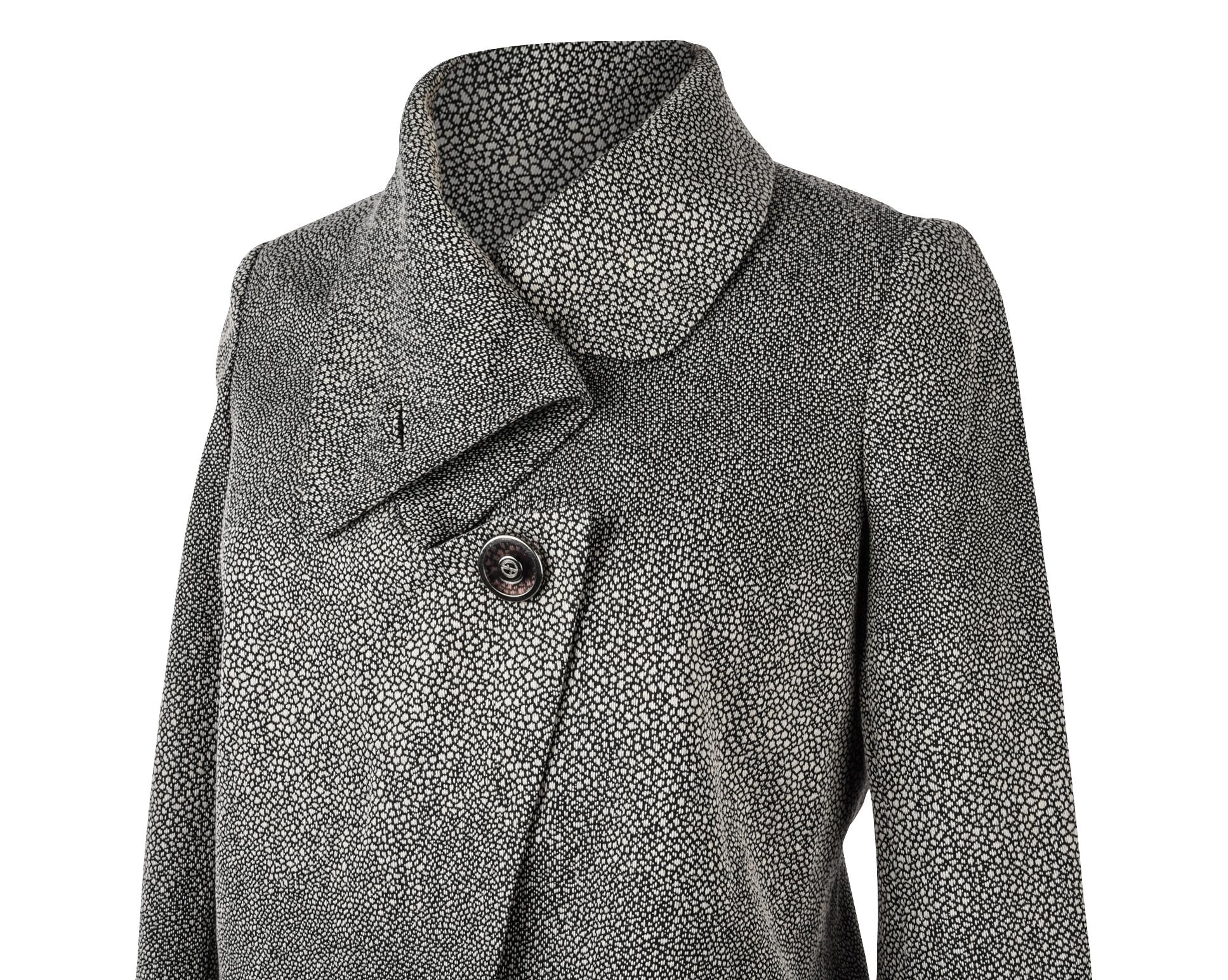 Guaranteed authentic Giorgio Armani unique stingray black and light gray styled print.
Dramatic collar can be worn a myriad of ways.
Off center clear and metal button is placed high toward neckline with peak lapel design.  
Modified swing jacket