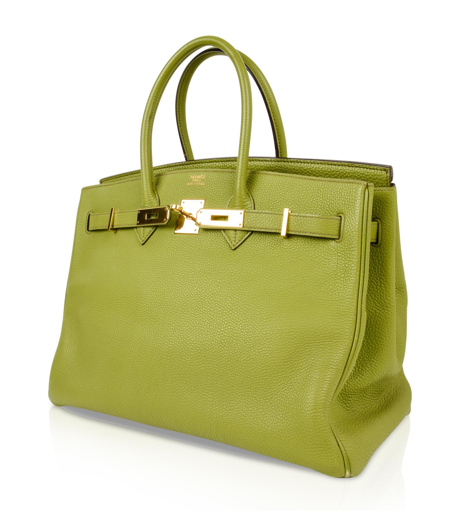 Guaranteed authentic Hermes Birkin 35 no longer produced Chartreuse. 
Togo leather lush with Gold hardware.
Comes with lock and keys in the clochette and sleepers. 
She is pre loved with wear on the corners and scratches on the hardware.
Leather is