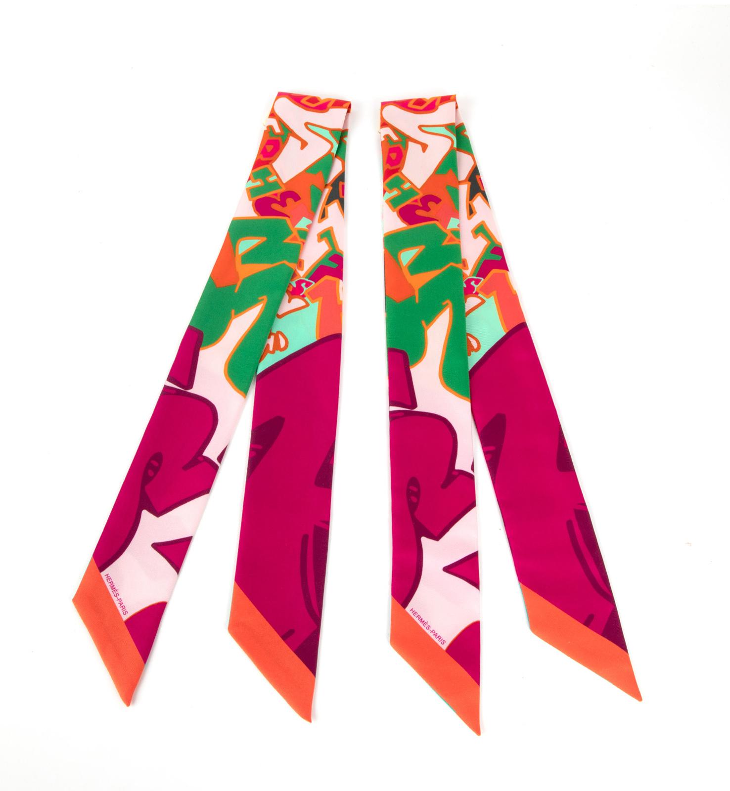Guaranteed authentic Hermes Twilly Graff - Graffiti - by Kongo.
Glorious fresh summer Fucshia Orange and Green. SO pretty.
Each one comes with Hermes box and ribbon.
NEW or  NEVER WORN.
final sale

SIZE
32