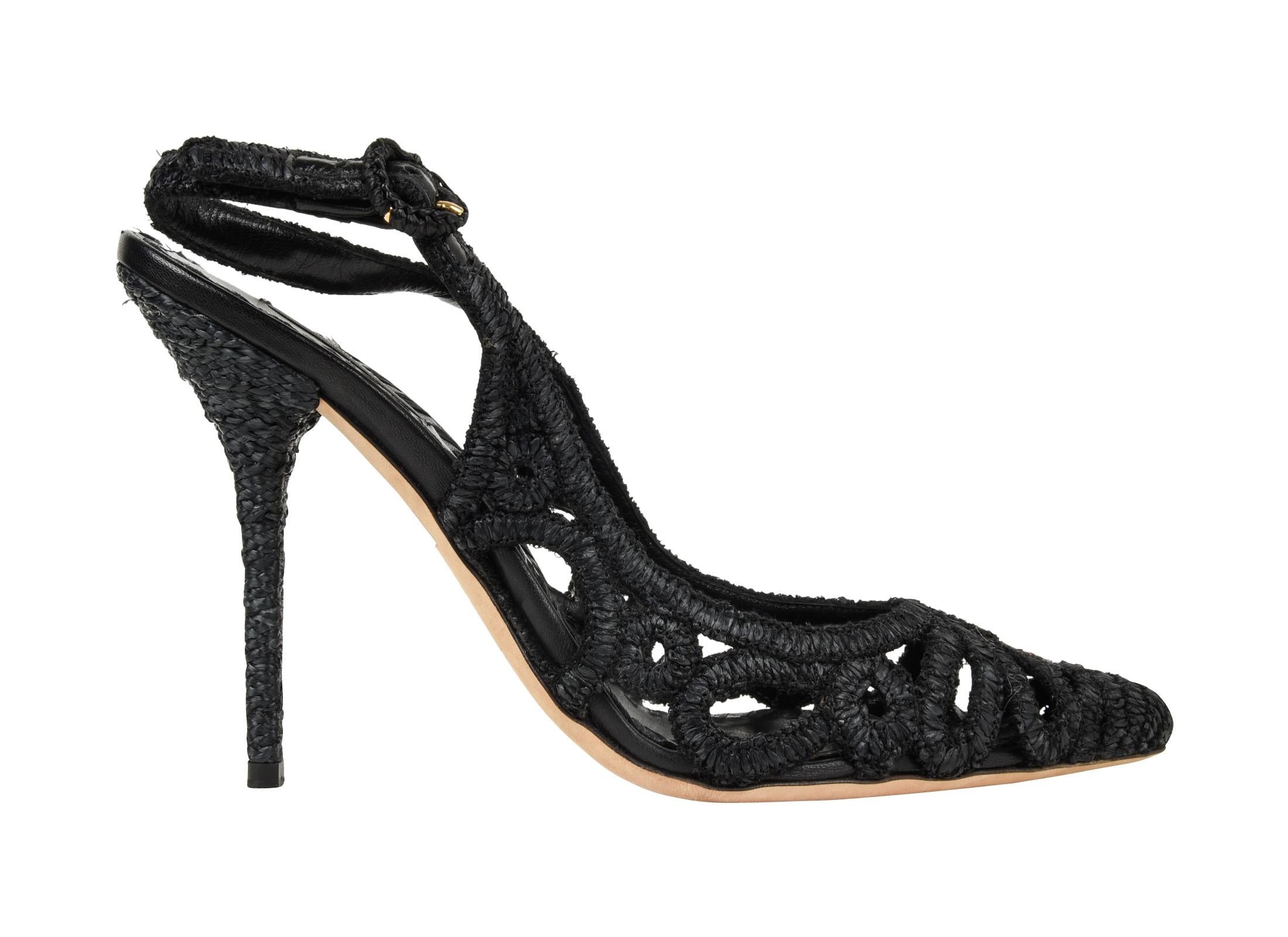 Guaranteed  authentic Dolce&Gabbana black rafia slingback has cutouts with front flower design. 
Stiletto heel is rafia covered.
Divine summer shoe from jeans to pretty dresses.    
final sale
        
SIZE  40
USA SIZE  10  
     
SHOE 