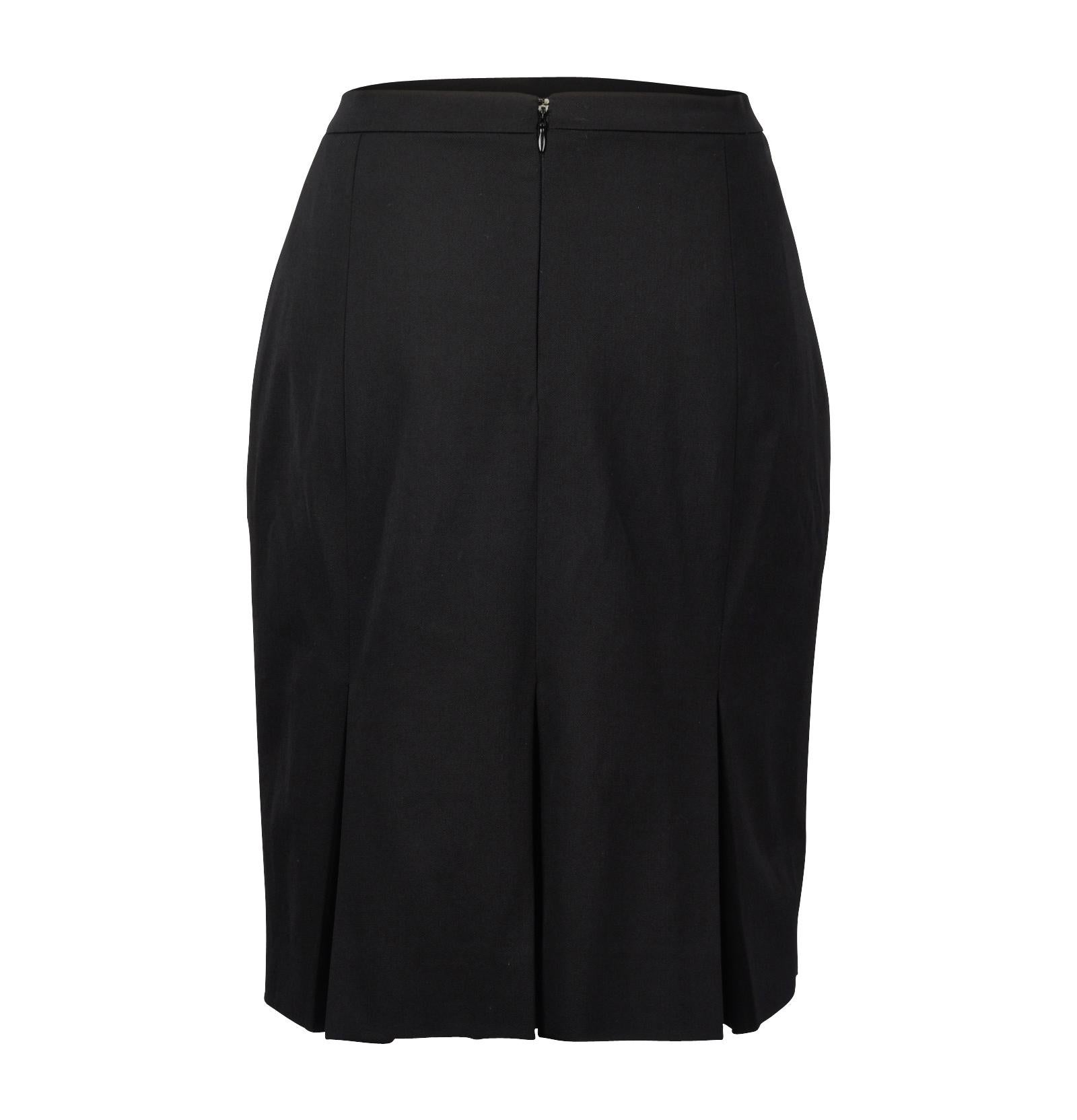 Guaranteed authentic Christian Dior black pleated skirt. 
Straight cut with Front inverted pleat
Rear has box pleats
Rear hidden zip with hook and eye closure at waist. 
Fully lined.
No fabric or size tag. Feels like a light wool.
Final arle
Please