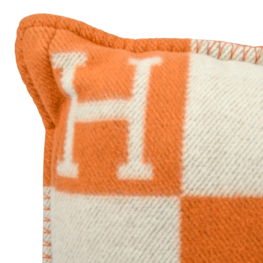 Guaranteed authentic Hermes classic PM Avalon I signature H pillow in iconic Orange.
The removable cover is created from 85% Wool and 15% cashmere and has whip stitch edges.
New or Pristine Store Fresh Condition.  
Comes with sleeper.
Please see the