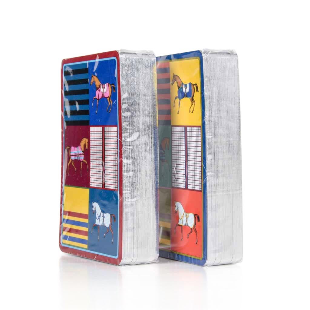 Guaranteed authentic Hermes Couvertures Nouvelles Bridge playing cards. 
Sets are multicolored depicting horses with blankets and stripes.  
The cards are new and sealed.
Set includes two 54 cards decks. 
Comes with signature Hermes box and ribbon.