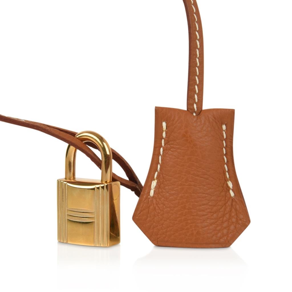 Guaranteed authentic  Hermes Birkin 35 bag featured in iconic Gold.    
Ultimate classic in togo leather.   
Lush with gold hardware.     
Comes with lock, keys, clochette, sleepers, raincoat and signature Hermes box.
NEW or NEVER WORN
final