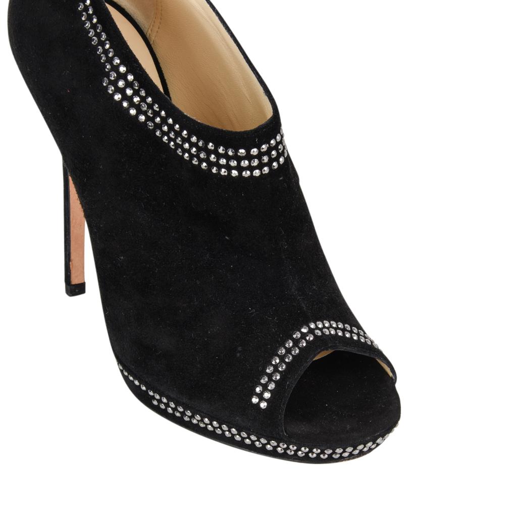 Guaranteed authentic Jimmy Choo fabulous peeptoe ankle boot bootie.  
Jet black suede with stiletto heel.
Edged in small silver studs.
Small platform and rear zipper. 

SIZE  37
USA SIZE  7

BOOT MEASURES:
HEEL 4.5