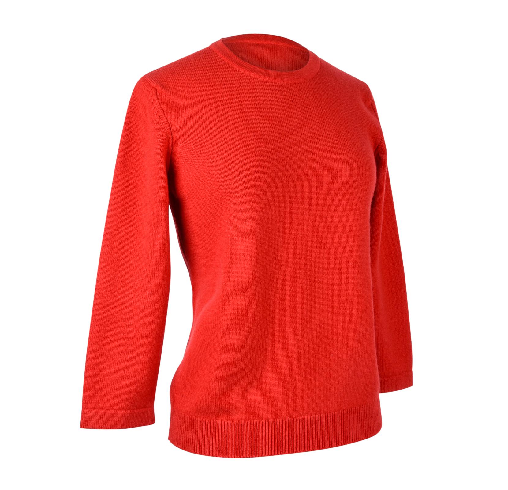 Guaranteed authentic Hermes red pullover sweater.
Crew neck and 3/4 length sleeve.
Sweater has ribbing around cuffs and hip.
No size or fabric tag.
Very minor piling.
final sale

SIZE fits S - M

SWEATER MEASURES:
LENGTH  22.5