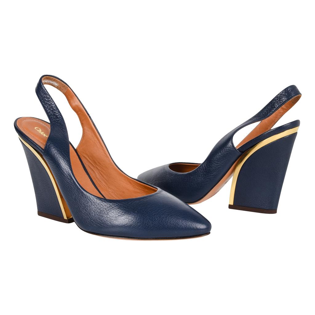 Guaranteed authentic Chloe rich royal blue beautifully detailed block heel slingback shoe 
Gold trim around the top and side of heel. 
Gently rounded toe.
Versatile and wearable.
NEW or NEVER WORN

SIZE 39
USA SIZE 9

SHOE MEASURES:
UPPER (INNER)