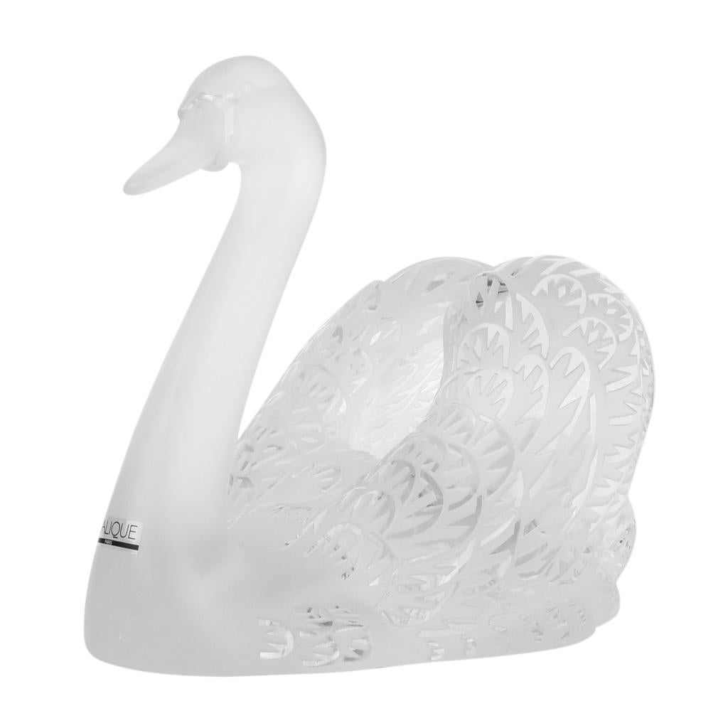 Mightychic offers a Lalique pure crystal satin finish coveted Swan Up sculpture. 
First designed in 1943 by Rene Lalique this ethereal swan is depicted gliding with her wings back and head held high. 
Hand crafted in France.
Please see the companion