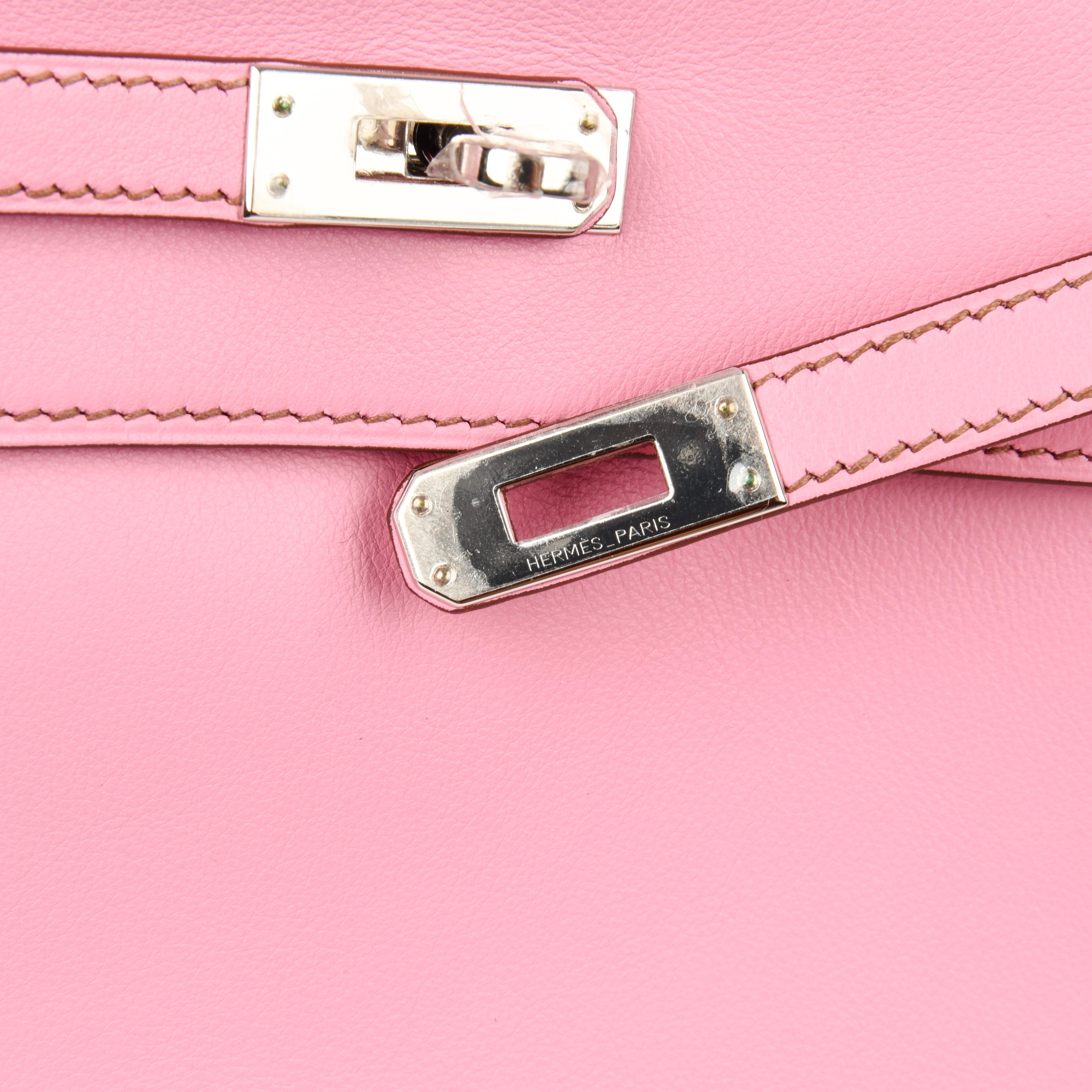 Guaranteed authentic Hermes Kelly Danse bag in exquisite 5P Pink Swift Leather.
A super versatile bag, it can be carried as a waist bag, cross body, shoulder bag, or without strap, as a clutch. 
Chic and fresh with Palladium hardware.   
Comes with
