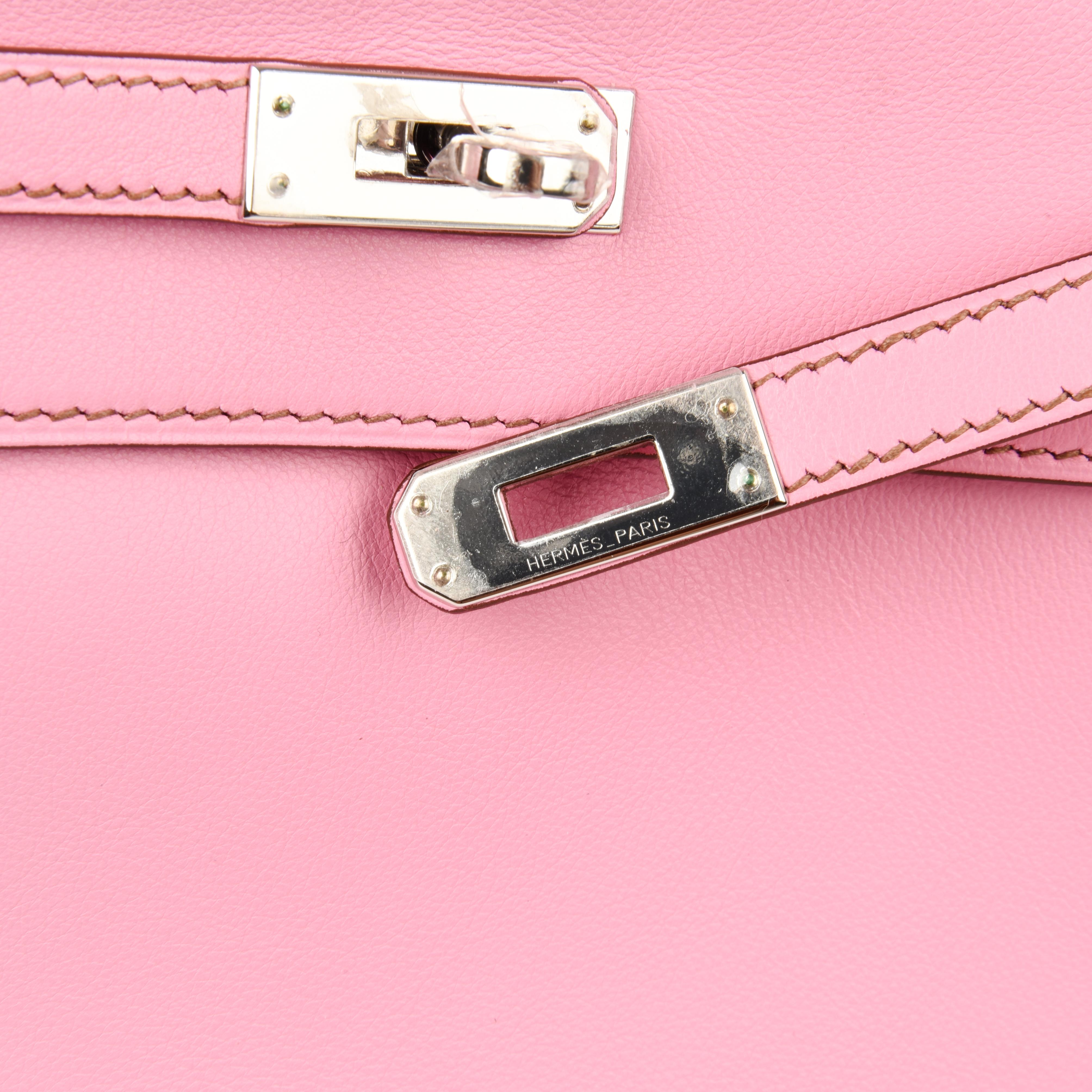 Guaranteed authentic Hermes Kelly Danse bag in exquisite 5P Pink Swift Leather.
A super versatile bag, it can be carried as a waist bag, cross body, shoulder bag, or without strap, as a clutch. 
Chic and fresh with Palladium hardware.   
Comes with