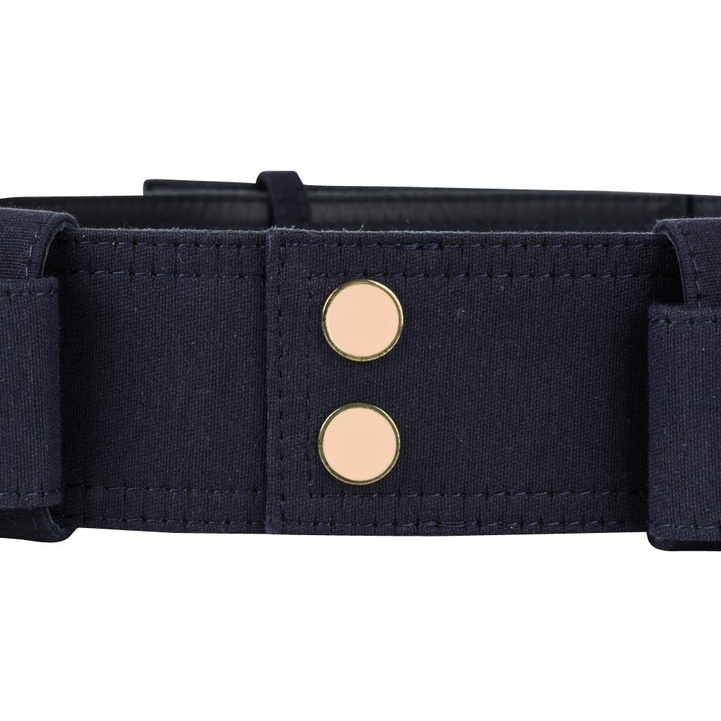 Chloe blue marine canvas on leather belt.
Has a sense of being Cargo inspired!
Wraps around waist to close at rear with double row of 5 snaps.
Front has 2 pale pink enamel snaps at sides and 2 faux snaps in front.  
Signature CHLOE MADE IN ITALY is