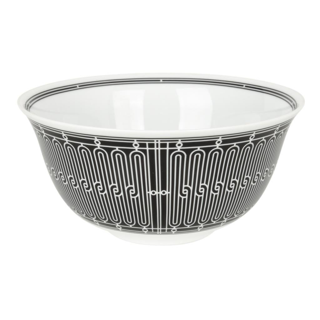 Guaranteed authentic Hermes H Deco bowl featured in Black with White.
Features Art Deco wrought-iron friezes.
The bowl is porcelain and measures 7.1