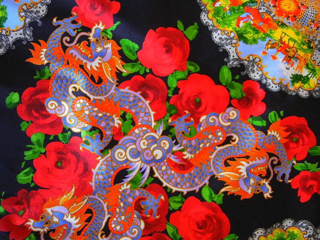 Guaranteed authentic Dolce & Gabbana exquisite vintage full length pencil skirt.
Intricate Asian inspiration print of dragons, flowers and fans.
Bright exotic colours on a black background with gorgeous red roses.
Rear closes with corset type hidden