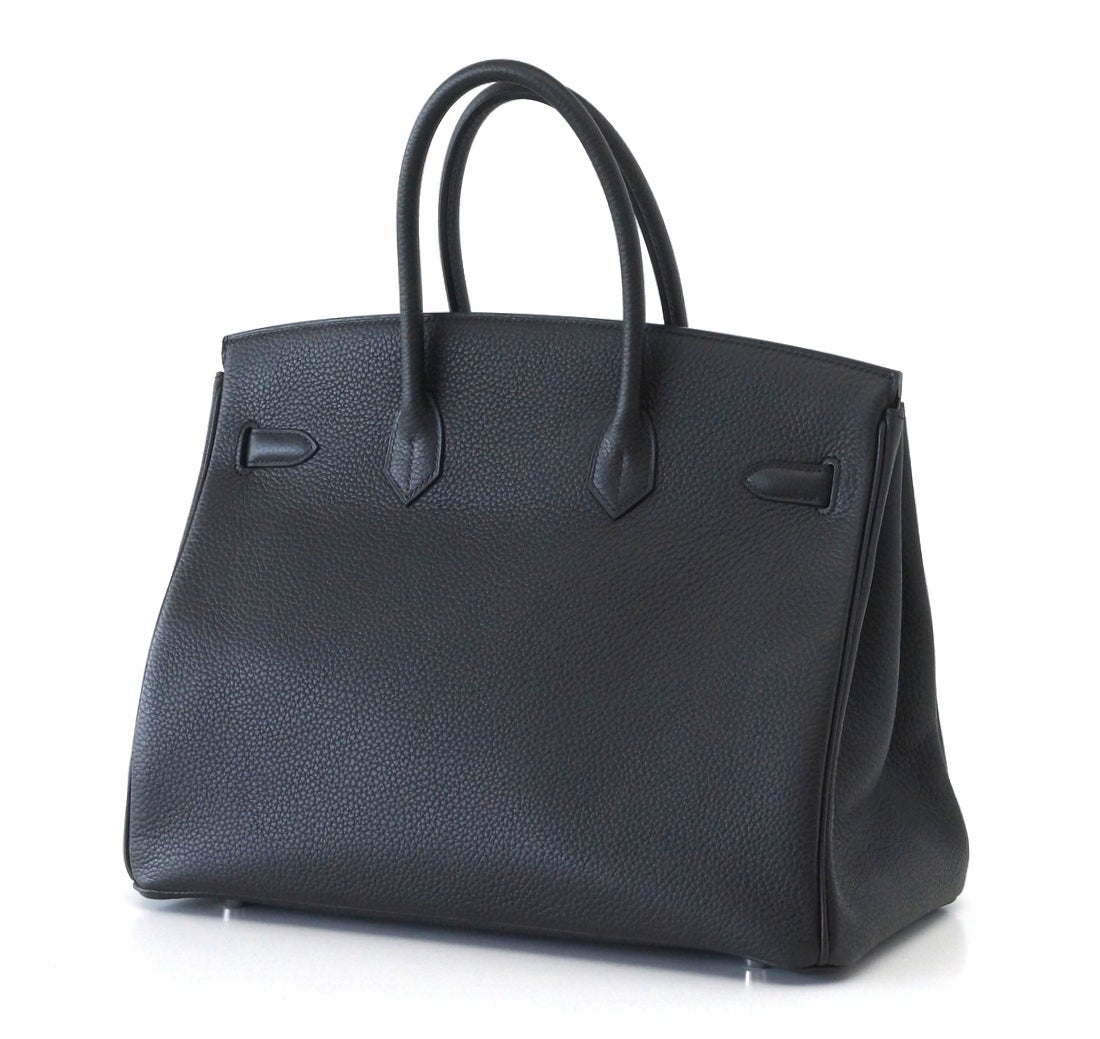 New colour PLOMB is a matte off black that is chic fresh and sophisticated.
Striking with palladium hardware.
Luscious Togo leather that is scratch resistant.
Comes with lock, keys, clochette, sleepers, raincoat and orange Hermes box with