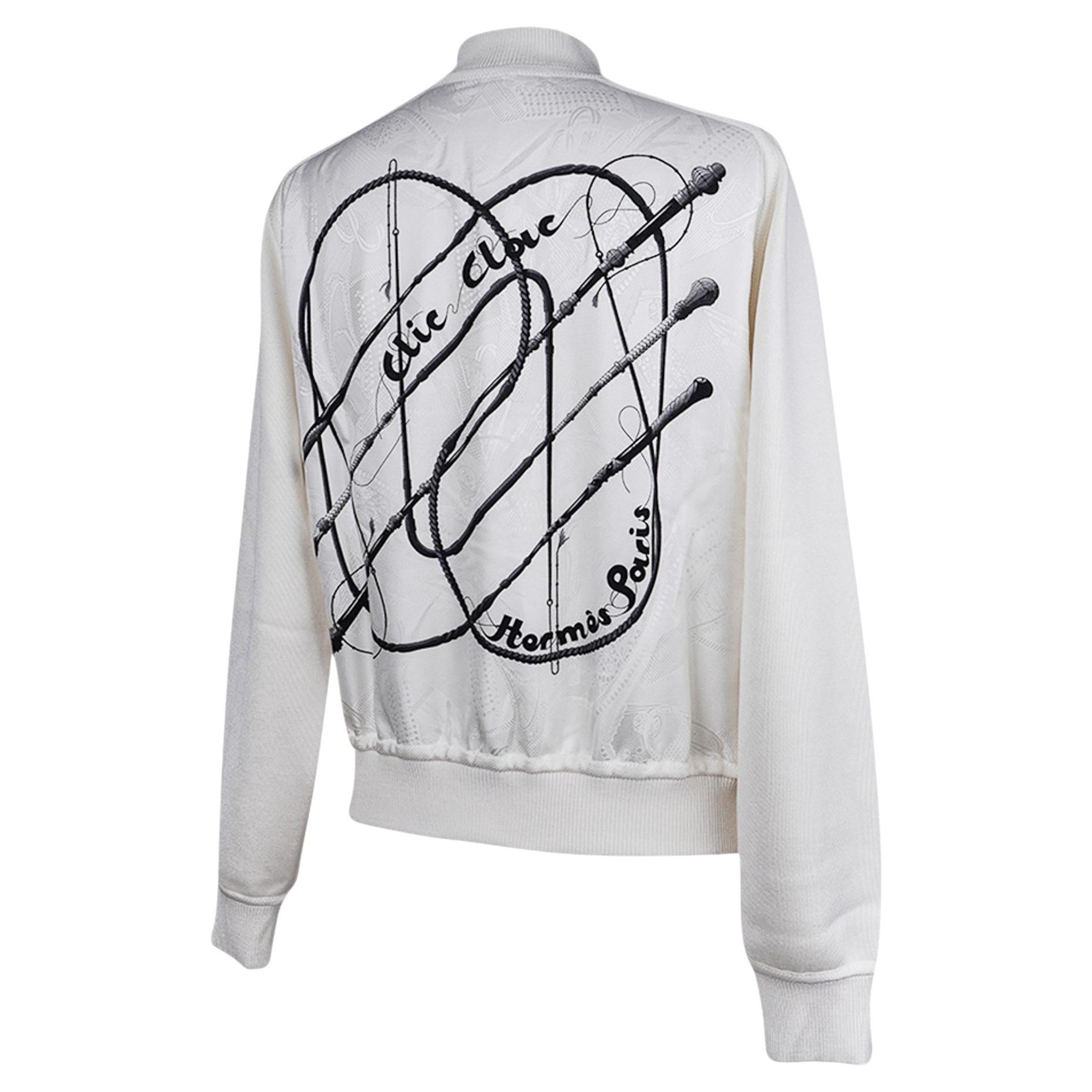 Veste Cardigan Hermès blanche d
hiver avec fermeture éclair et fermoir à bouton-pression, taille 38/6