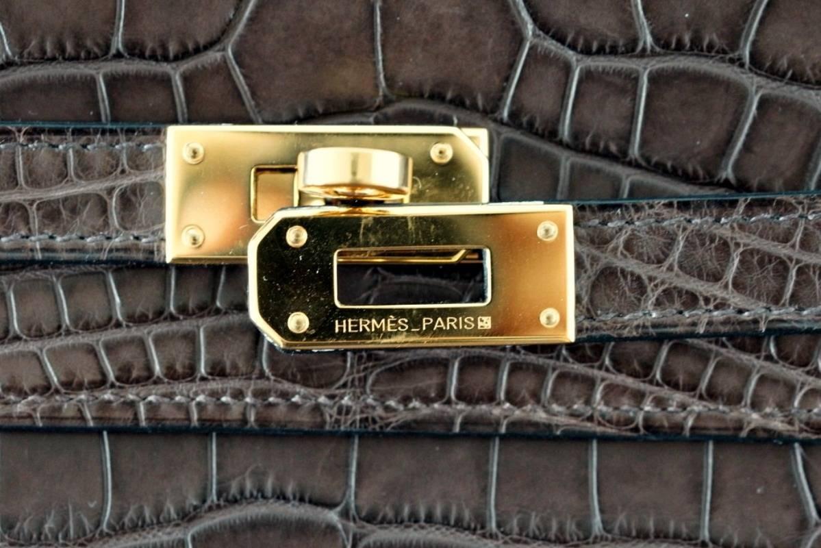 Rich medium brown Hermes Kelly Long matte Havanne wallet that is also carried as a clutch. 
This gorgeous rich brown is no longer produced.
Accentuated with lush gold hardware.  
Easily carried day or night. 
The perfect size to grab and go.