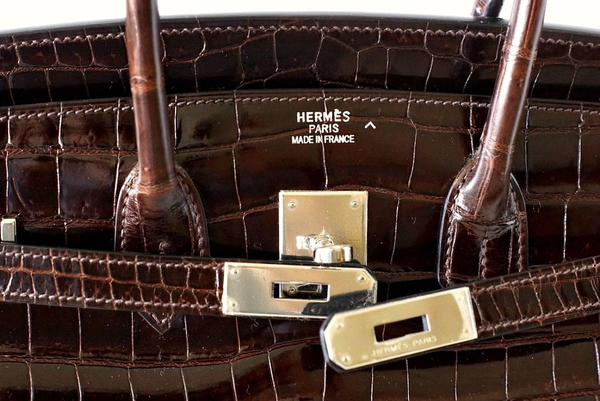 This exquisite Chocolate Brown Porosus Crocodile Birkin is the epitome of chic.  Very rare colour to find in the shiny finish.
Brown is the new black for Fall and this colour is making a big comeback.
Porosus, made from smaller scales, is the