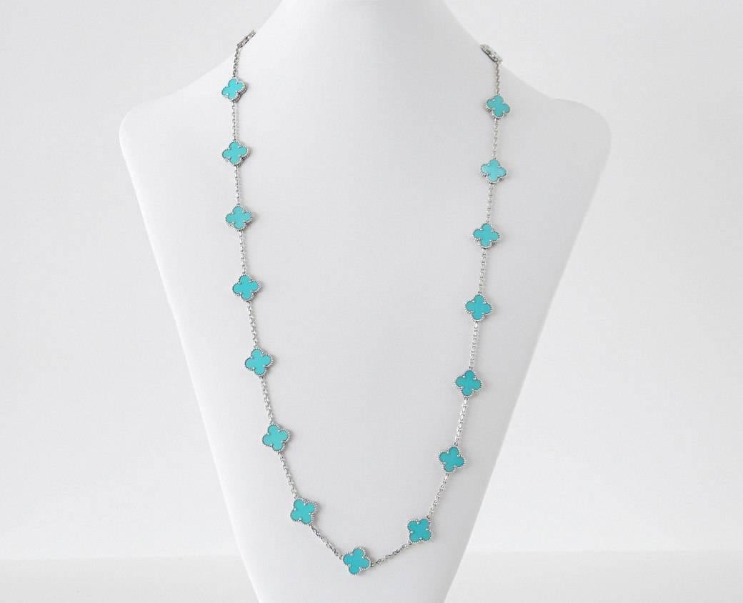 Guaranteed authentic rare and highly collectible Van Cleef & Arpels Alhambra Collection necklace in very rare to find exquisitely beautiful 20 Turquoise Motifs.
Rarely seen in 18K White Gold. 
Necklace can be worn as a single strand or