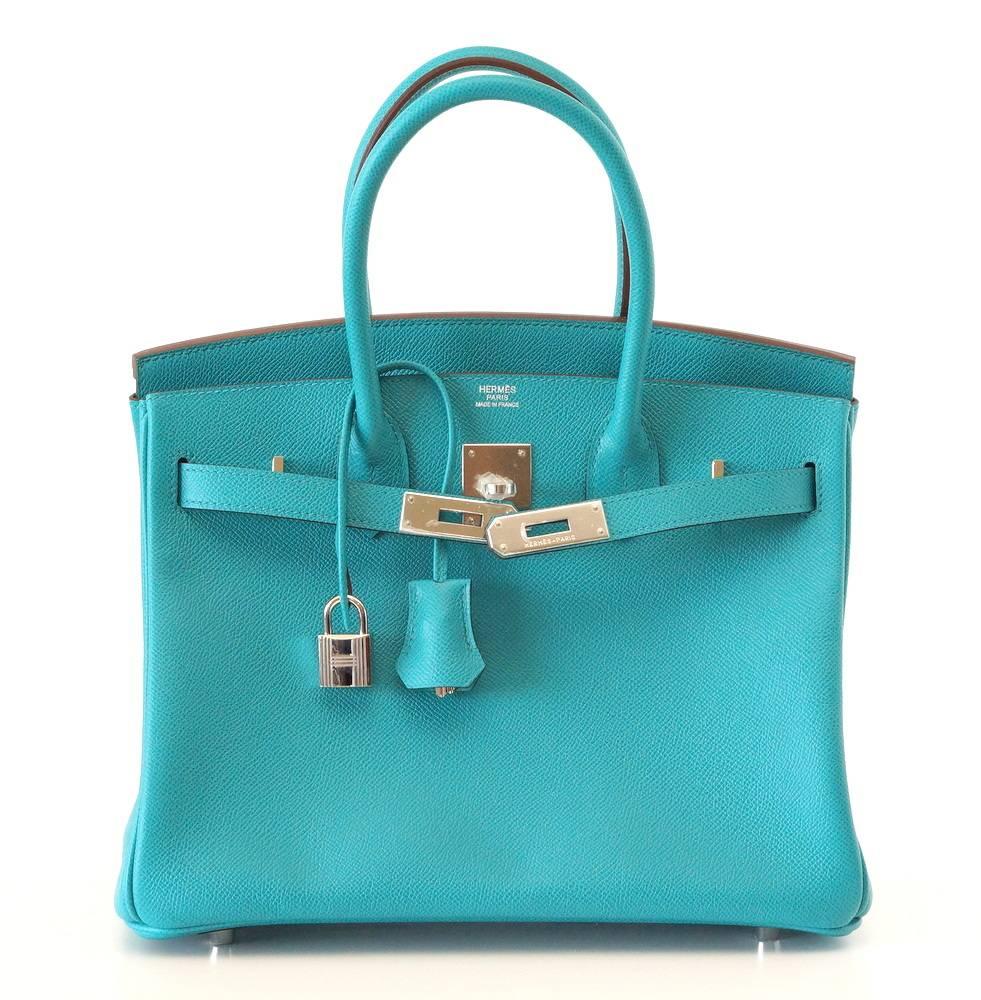 Guaranteed authentic Hermes 30 Birkin bag in gorgeous Blue Paon is a retired colour and very rare to find. 
Particularly clear and beautiful in epsom leather.
Fresh with palladium hardware.
NEW or NEVER WORN. 
Comes with the lock and keys in the