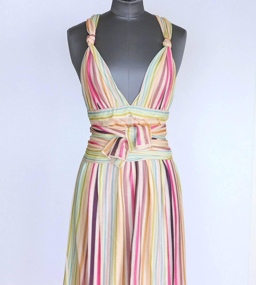 Guaranteed authentic MISSONI runway faux wrap dress in beautiful pastel hues. 
Classic Missoni light knit in shades of pink, mauve, turquoise, almond gold, sage, aqua and nude on bone.
A deep V accented by the knot of fabric in front of the shoulder