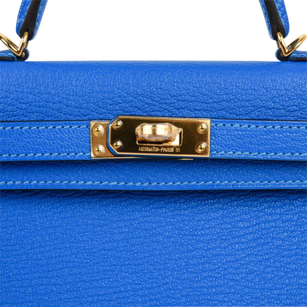 Hermes Limited Edition Kelly 20 Mini ll in extoic Blue Hydra Chevre leather.
This jewel tone is accentuated with gold hardware.   
Divine size for day to evening.
Comes with signature HERMES box, shoulder strap, and sleeper.
NEW or  NEVER WORN.