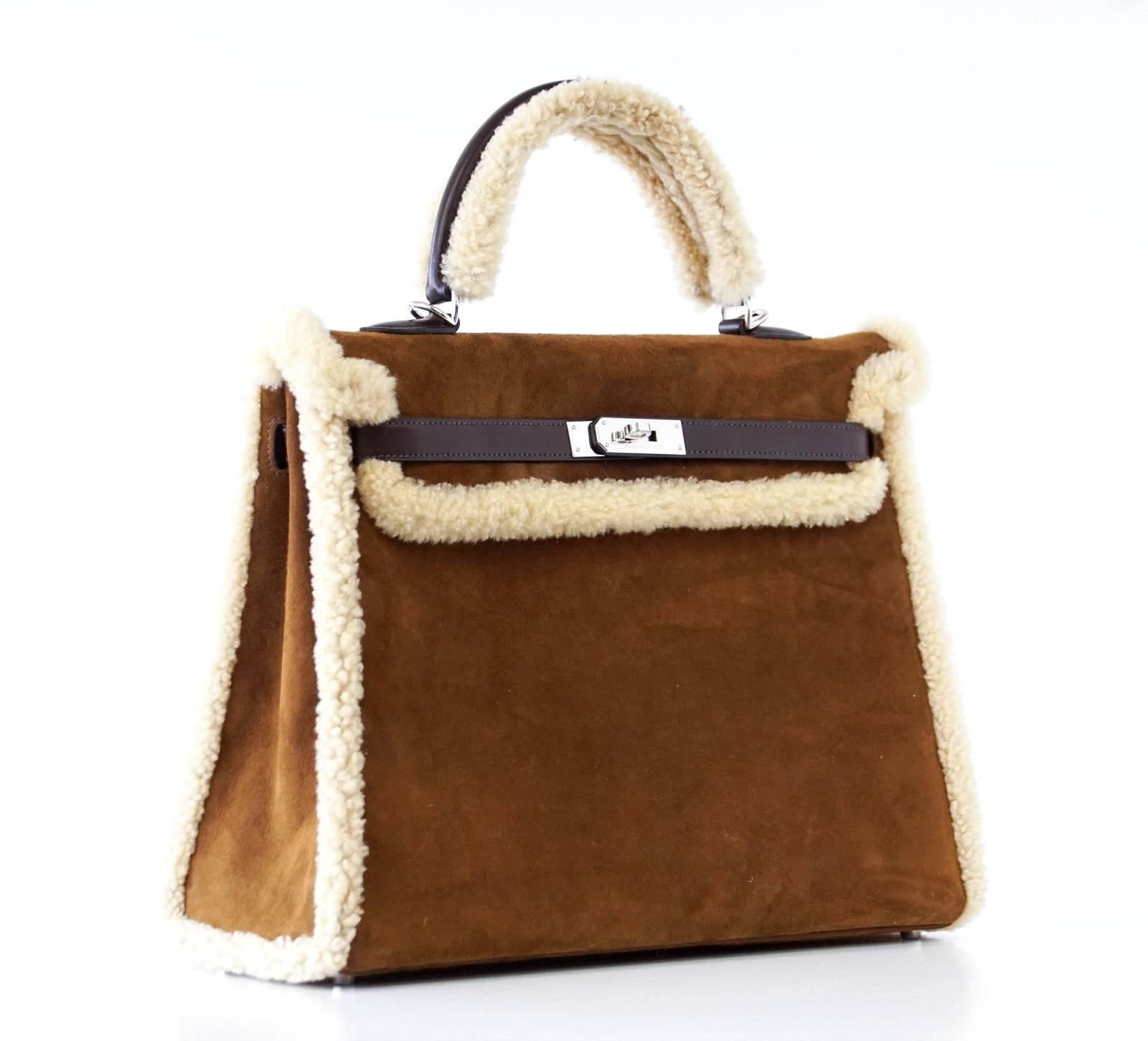 Guaranteed authentic rare Limited Edition Teddy Shearling Kelly bag.
This plush beauty is a true collectors treasures!
Palladium hardware.  
Chevre leather interior. 
Body, corners, handles and interior are mint. 
Plastic on feet.
Extremely