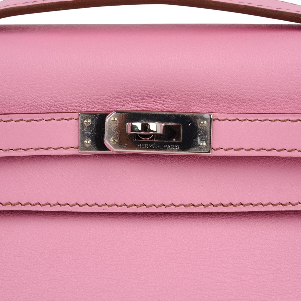 Guaranteed authentic Hermes Kelly Pochette clutch bag features coveted urban legend 5P Pink!
Kelly pochette (also known as JPG Pochette and now as Kelly Mini) with fresh palladium hardware in swift leather.
Stamped HERMES MADE IN PARIS on the