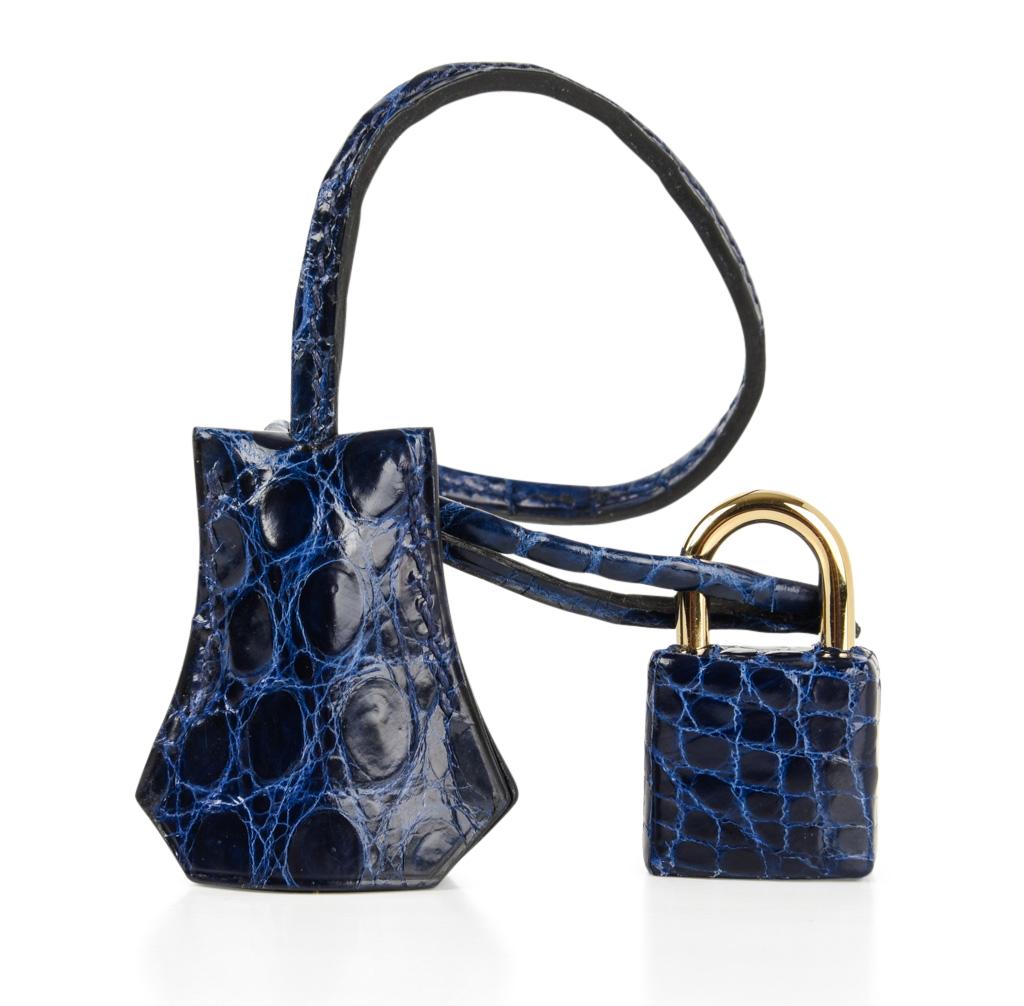 Guaranteed authentic Hermes Birkin 35 bag coveted jewel toned beautiful Blue Sapphire Porosus Crocodile.
Rich with Gold hardware.
Breathtaking bag!
Comes with lock and keys in the clochette and sleepers.
Bag body, handles, corners and interior are