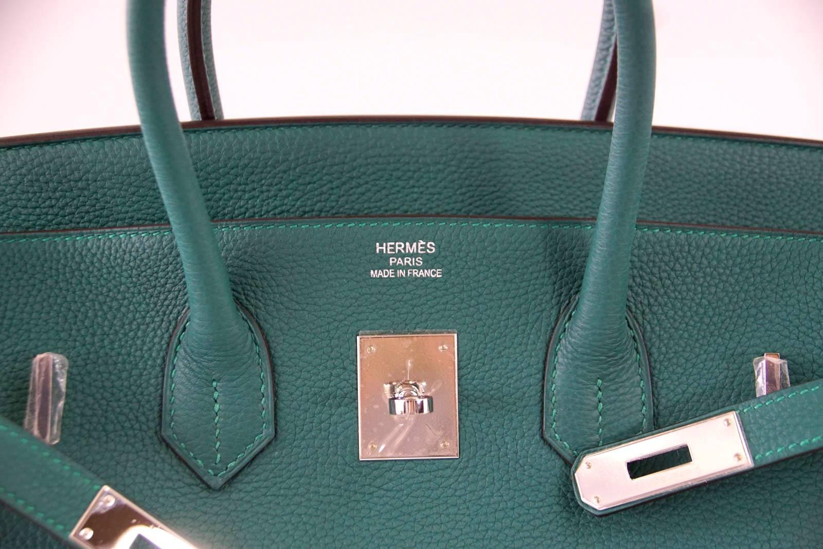 Guaranteed authentic Hermes Birkin in beautiful emerald toned Malachite - fabulous for year round wear.
Palladium hardware.  
Comes with lock, keys, clochette, sleeper, signature HERMES box and raincoat.
NEW or NEVER WORN 
final sale

BAG