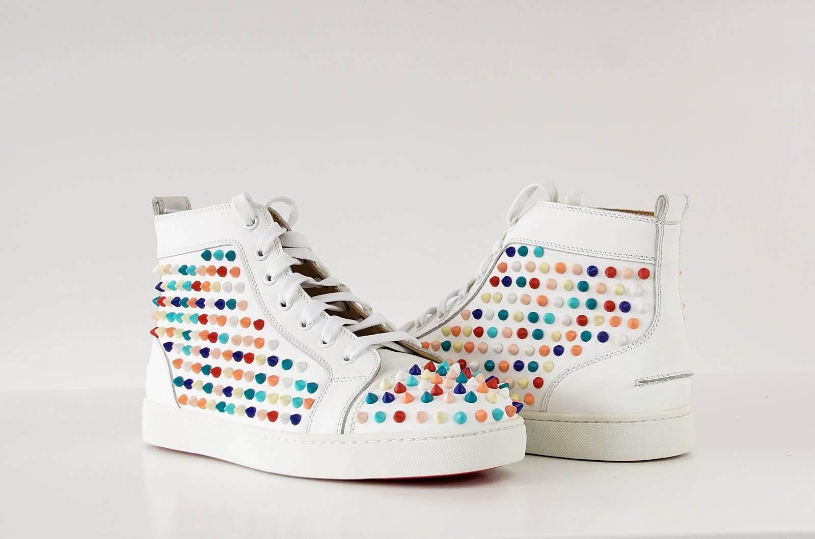 Guaranteed authentic CHRISTIAN LOUBOUTIN men's multicolored spike sneaker.
Crisp white with candy spike sneaker.
Logo plaque on side of shoe.
Comes with box and sleeper.
NEW or NEVER WORN. 
final sale

SIZE 43
USA SIZE 10

CONDITION:
NEW or NEVER