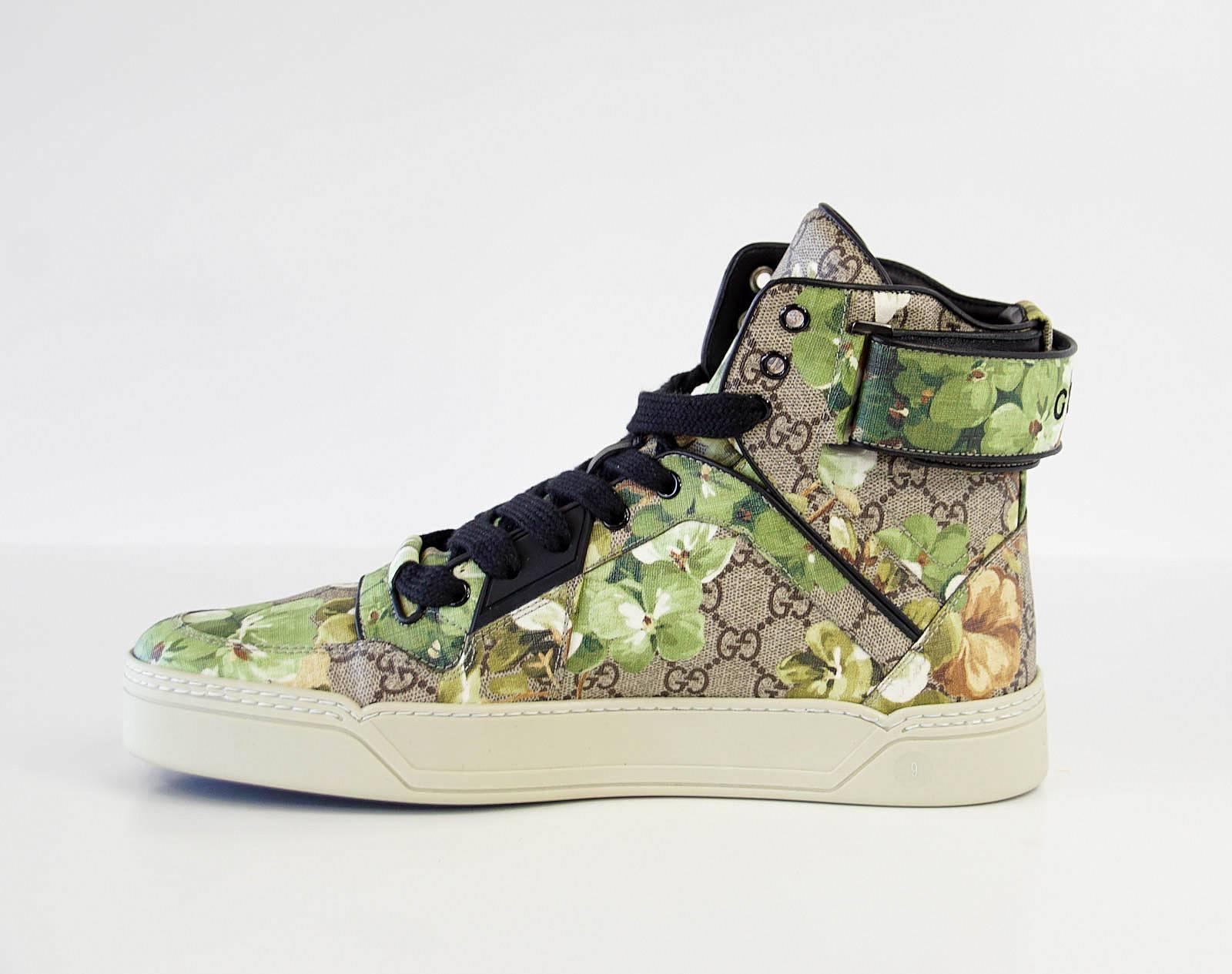 Guaranteed authentic GUCCI men's high top monogram Blooms sneaker.
GG logo canvas with green blooms. Divine!
GUCCI logo on rear edge.
Comes with signature box and sleeper.
NEW or NEVER WORN. 
final sale

USA SIZE 9

CONDITION:
NEW or NEVER WORN