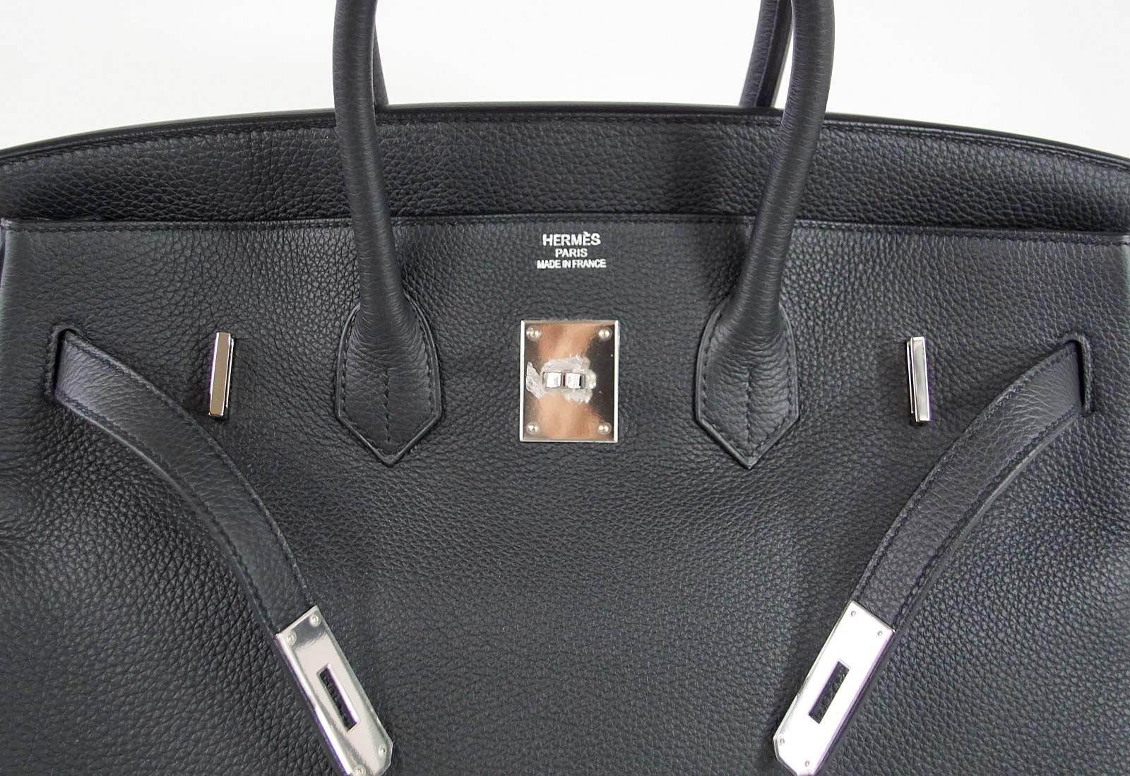 Guaranteed authentic Hermes Birkin 35 Off Black PLOMB is rare to find and so chic!
Fresh with palladium hardware.
Togo leather is textured and scratch resistant.
Please see the same bag available in 35 with gold hardware. 
Comes with lock, keys,