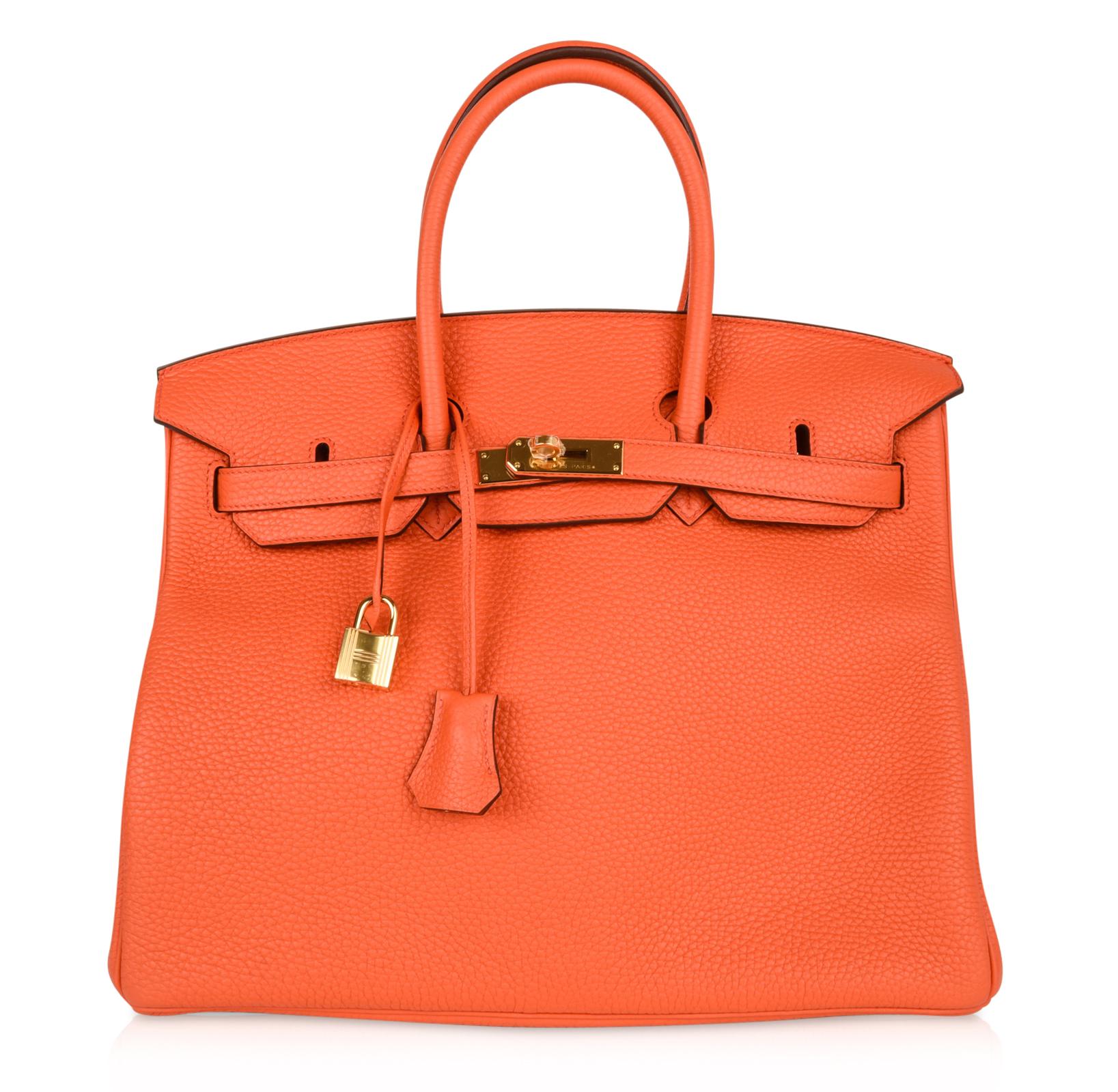 Guaranteed authentic Hermes Birkin 35 chic pop of color - beautiful Orange Poppy - fabulous for year round wear.
Lush with Gold hardware.
Please see the same bag available in 25 cm. 
Comes with lock, keys, clochette, sleeper, signature HERMES box