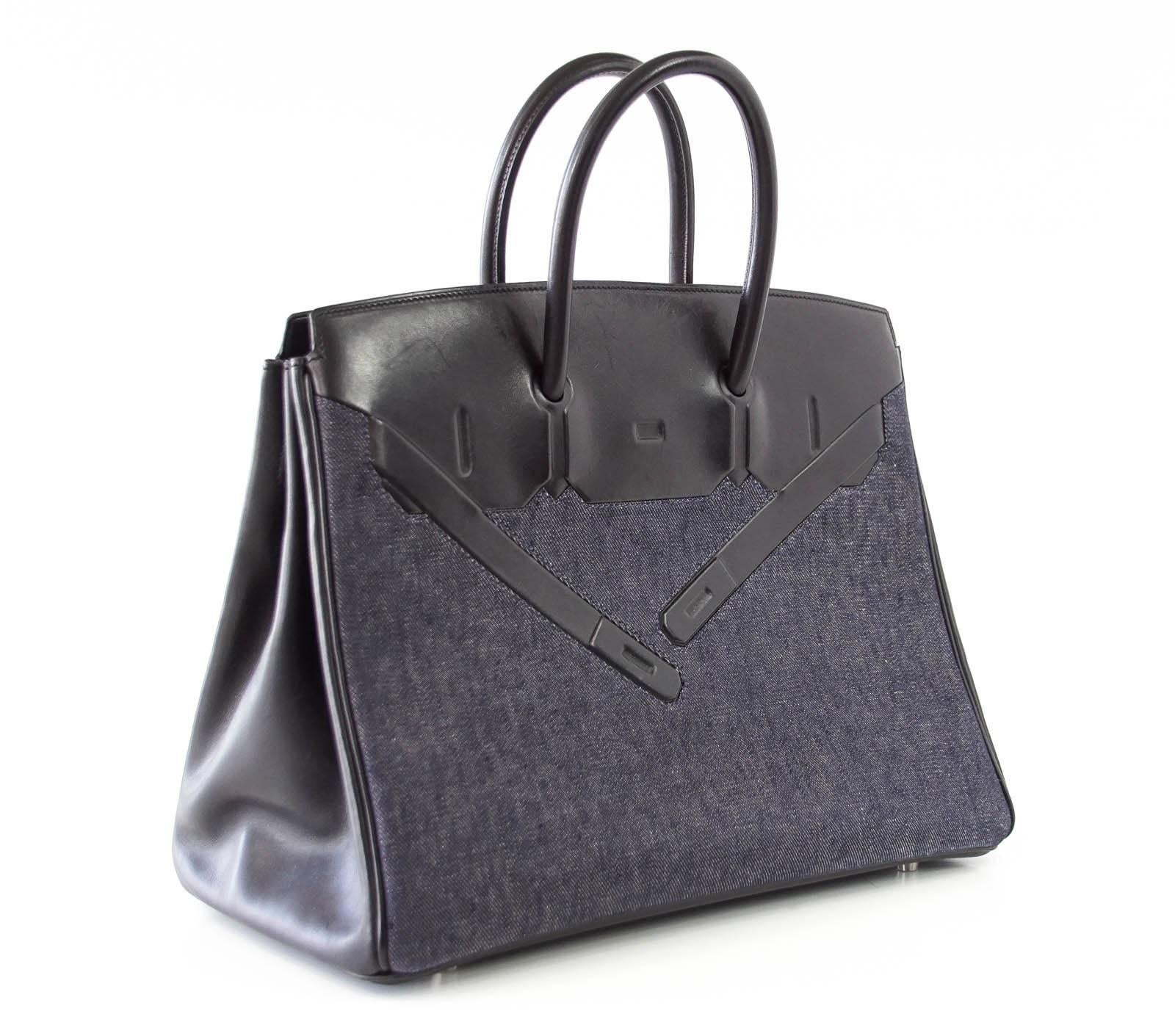 Guaranteed authentic very rare Limited Edition Shadow Denim Birkin.
This is a true Collectors treasure.
This beautiful bag conceived by Jean Paul Gaultier is the ultimate trompe l'oeil.
Comes with sleeper.
Just returned from TLC at Hermes