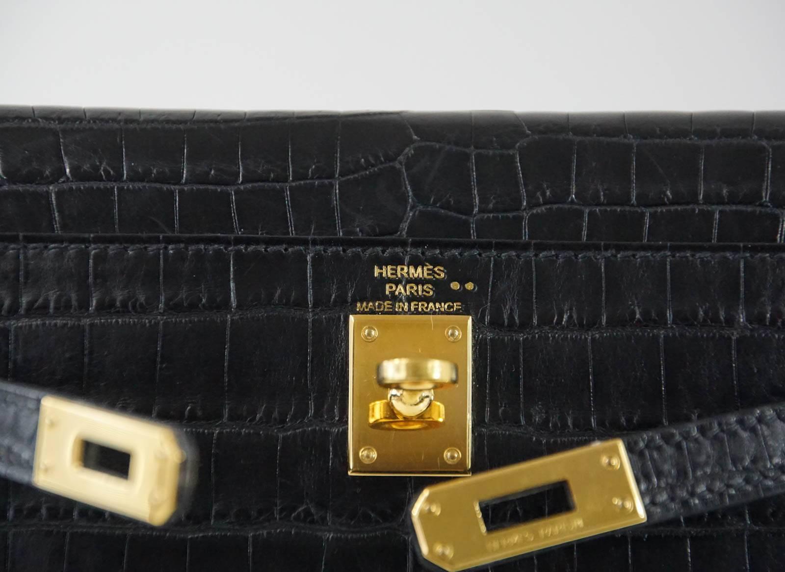 Guaranteed authentic urban legend Limited Edition Hermes Kelly Danse bag in matte Black Crocodile with lush gold hardware.
So rare, many believe it never existed!  And even more rare in Crocodile! 
This Kelly Danse is the most versatile bag created.