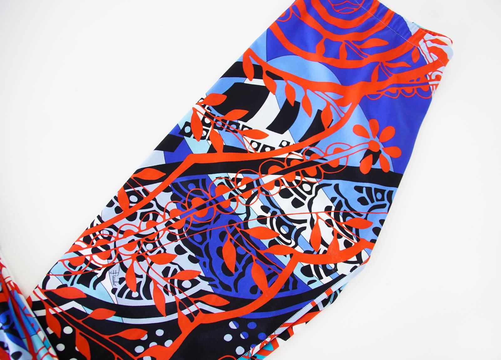 Guaranteed authentic EMILIO PUCCI multicolored leggings.
Slinky stretch ankle length legging in a vivid abstract print.
In shades of blue, red, black and white.
Fabric is polyamide and elastane.
final sale

SIZE 40
USA SIZE 6

PANT MEASURES:
LENGTH 
