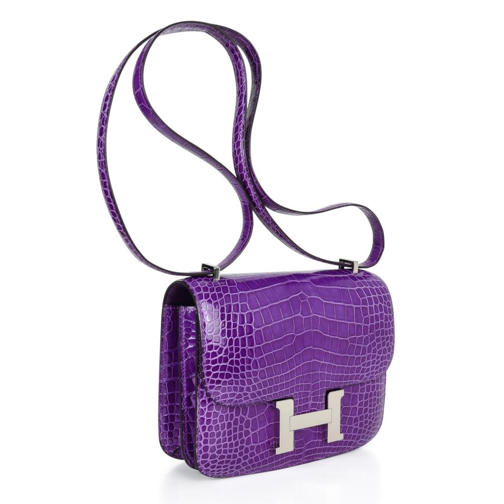 Guaranteed authentic coveted and rare 18 cm Constance in jewel toned Ultra Violet with palladium hardware.
Carried by hand, over the shoulder, or even across the body!
HERMES PARIS MADE IN FRANCE is stamped on front under flap.
NEW or NEVER