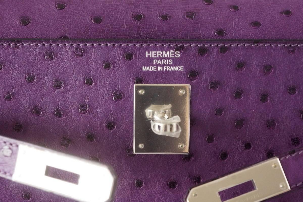 Guaranteed authentic rare Hermes Kelly 35cm bag features jewel toned exotic Violine Ostrich.
Fresh with palladium hardware.
NEW or  NEVER WORN.
Comes with Hermes box, raincoat, shoulder strap, sleepers, lock, keys and clochette.
final sale

BAG