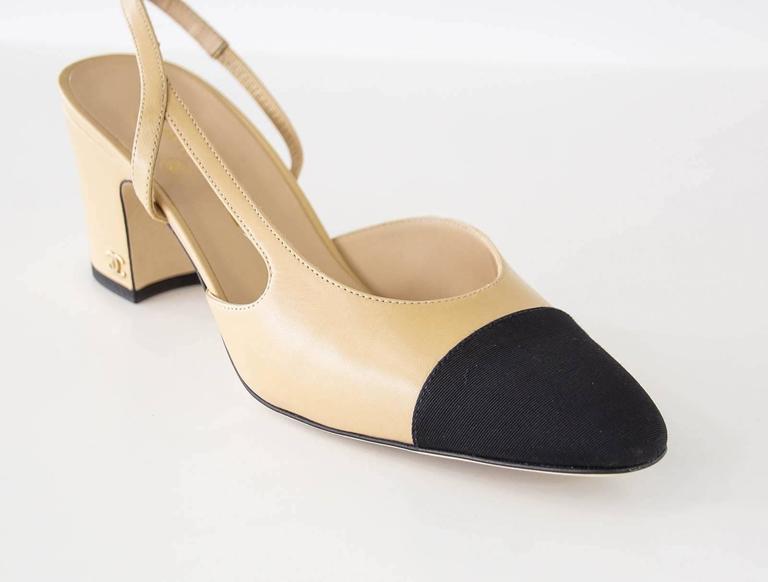 chanel beige and black shoes