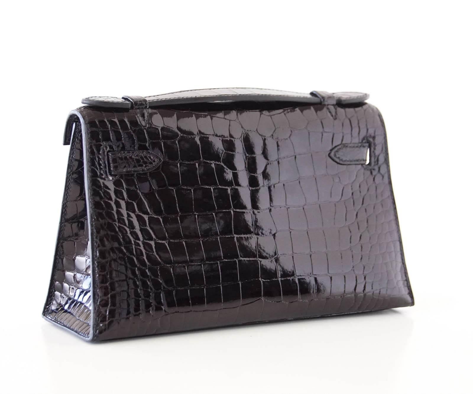 Hermes Kelly Pochette Clutch Bag Shiny Black Alligator Gold In New Condition In Miami, FL