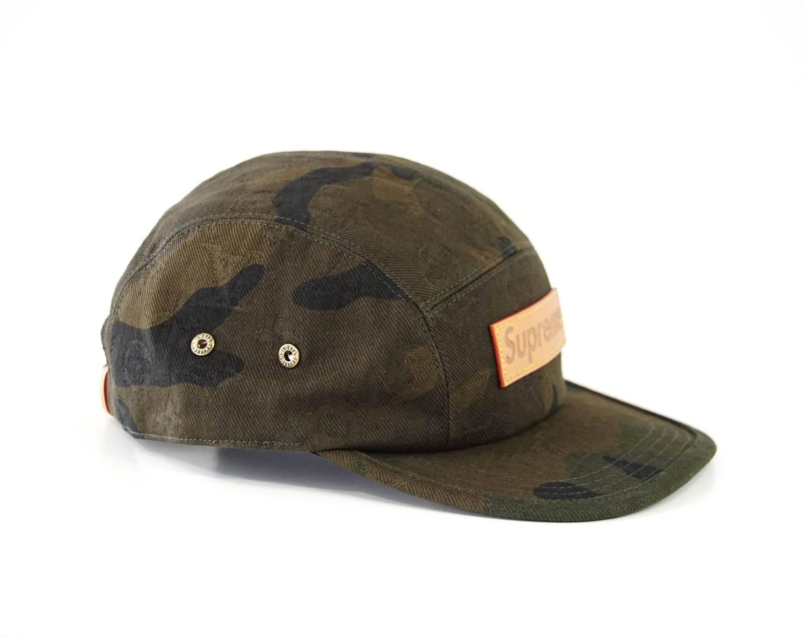 Guaranteed authentic highly coveted and sought after Louis Vuitton Supreme X  Limited Edition Green Camouflage 5 panel Cap.
Front Supreme leather plaque.
Adjustable rear leather strap with buckle.    
Comes with LV gift box.
NEW or NEVER WORN
      