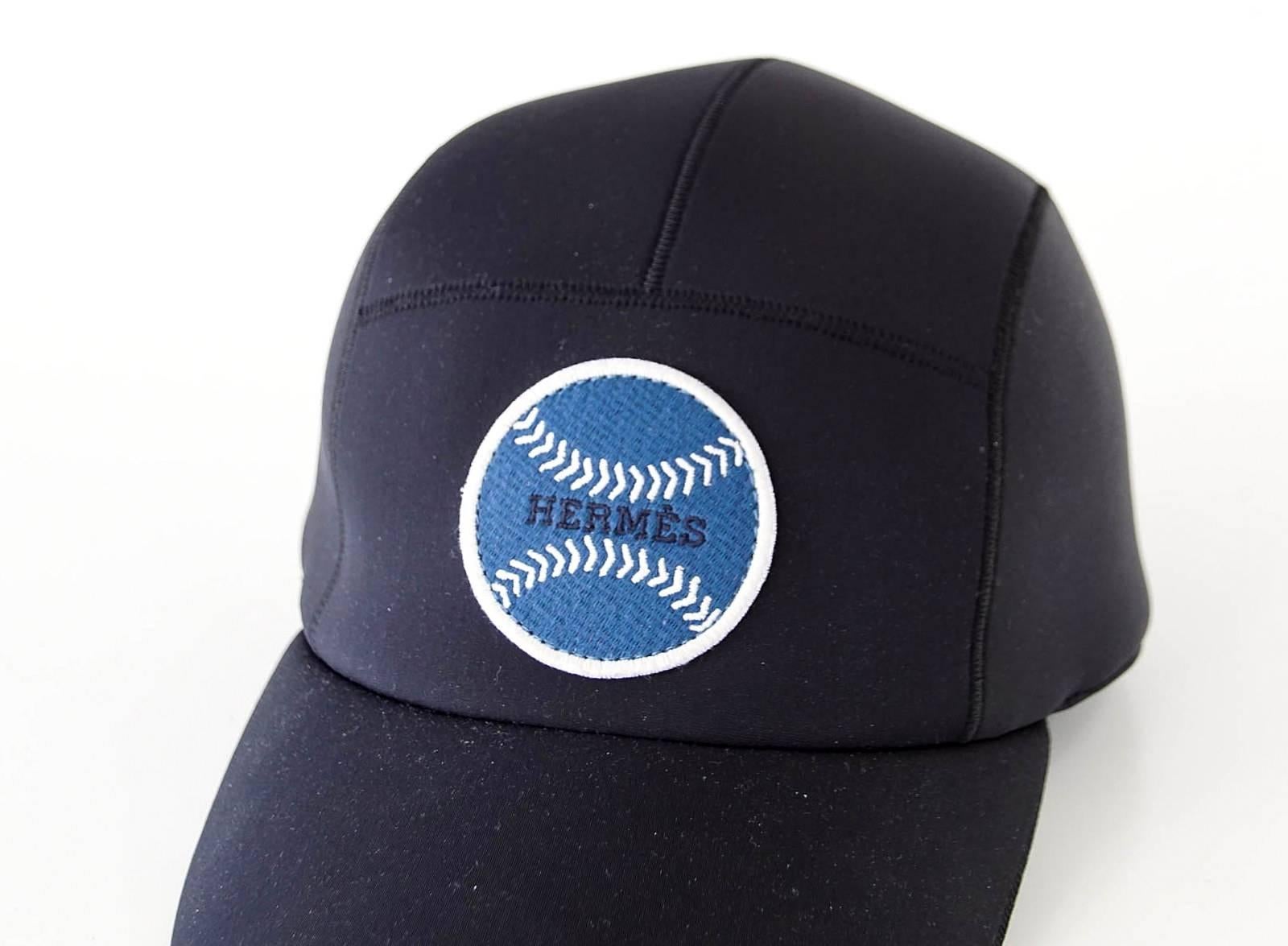 Guaranteed authentic Limited Edition Sold Out black Baseball cap.
Blue Baseball with white stitching and HERMES written in black across the center.
2 HERMES PARIS Clou de Selle snaps at rear.
Polyamide and elastane create a water resistant cap that