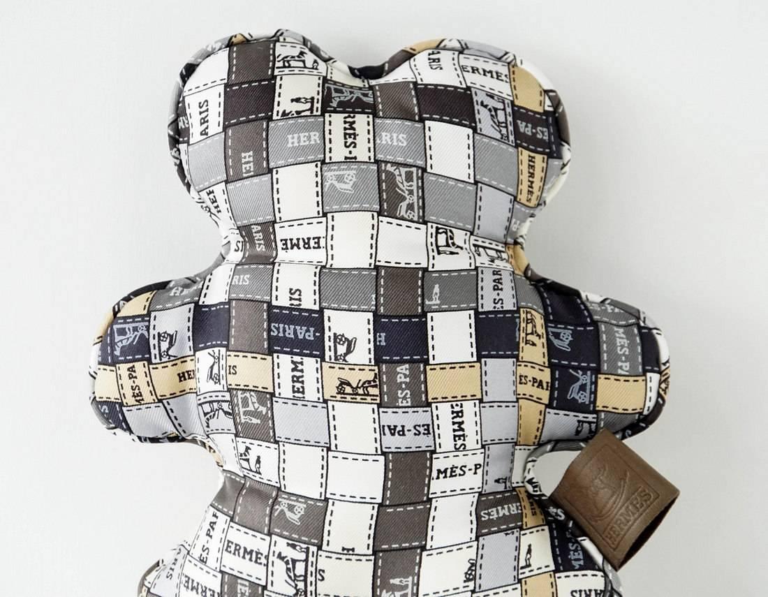 Guaranteed authentic charming HERMES Bolduc silk Dou Dou teddy bear.
In shades of taupe, grey, camel, white and creme. 
final sale

SIZE OF TEDDY BEAR:
LENGTH  6