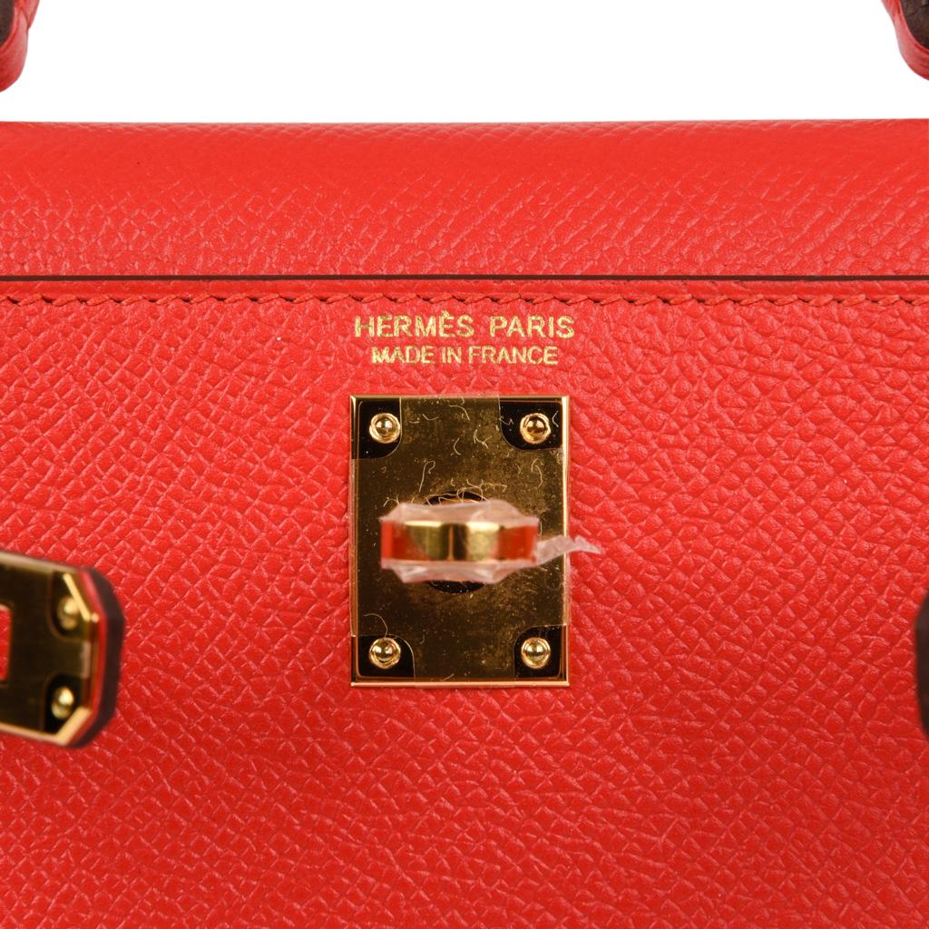 Mightychic offers a guaranteed authentic  Hermes Kelly Sellier 20 bag is featured in Rouge Tomate. 
This Kelly Sellier bag is stunning with gold hardware.   
Epsom leather is known to reveal the most beautiful saturation in colours.
Comes with